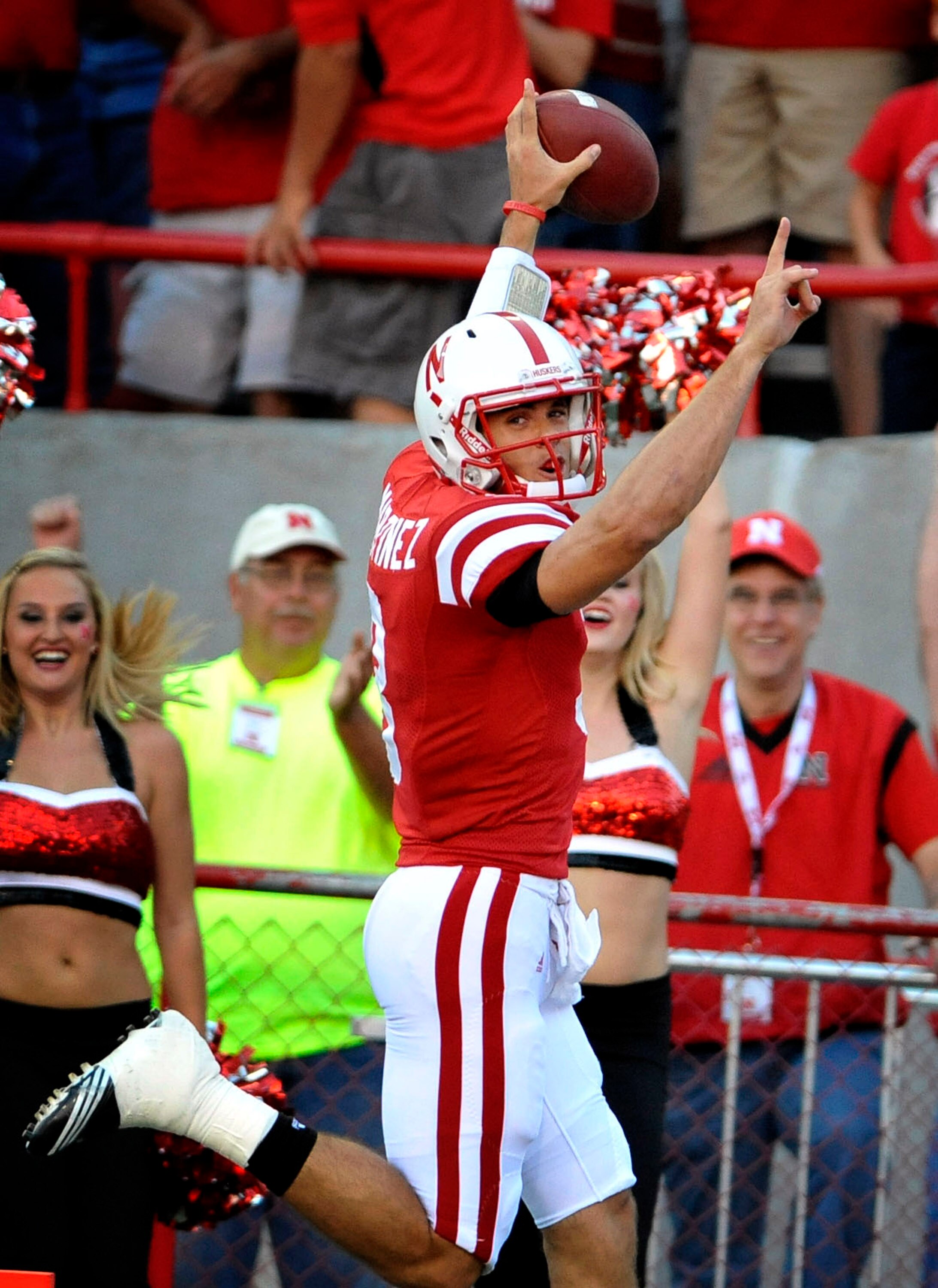 LINCOLN, NE - SEPTEMBER 04:  Taylor Matinez #3 of the Nebraska Cornhuskers scores his first touchdown as a Cornhusker during the first half against the Western Kentucky Hilltoppers at Memorial Stadium on September 4, 2010 in Lincoln, Nebraska.  (Photo by