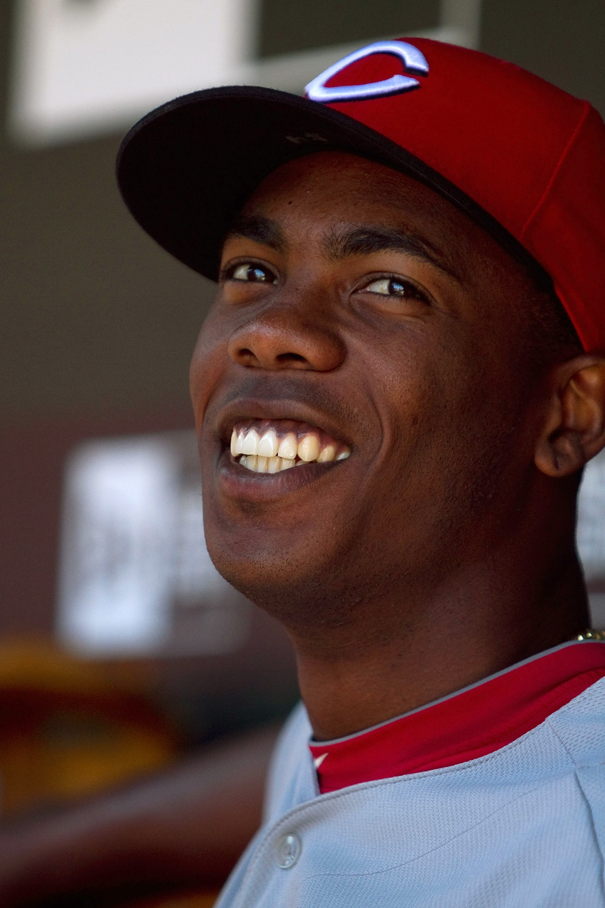 ST. LOUIS - SEPTEMBER 5: Reliever Aroldis Chapman #54 of the Cincinnati Reds sits in the dugout prior to playing against the St. Louis Cardinals at Busch Stadium on September 5, 2010 in St. Louis, Missouri.  The Cardinals beat the Reds 4-2.  (Photo by Dil