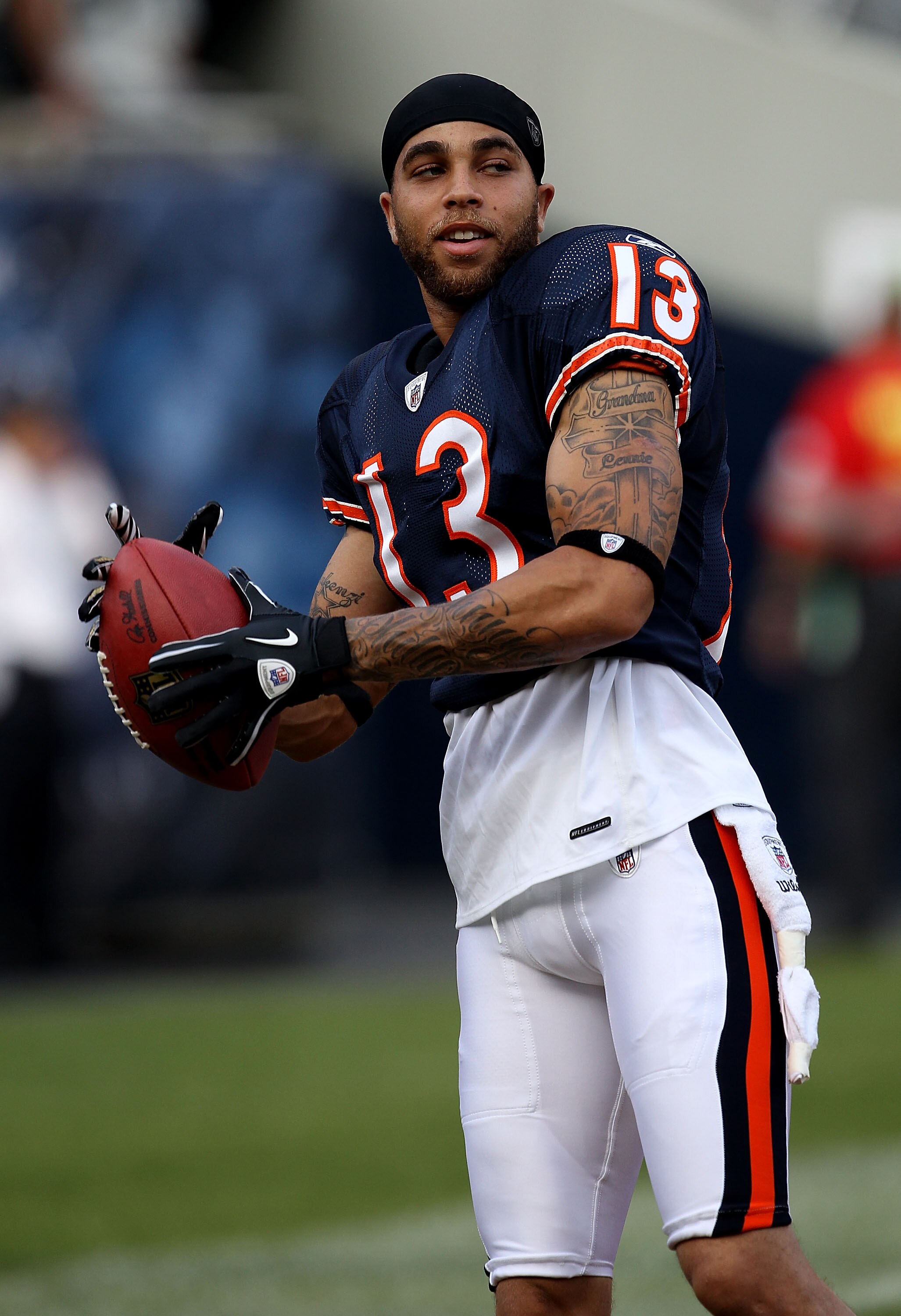 CHICAGO - AUGUST 21: Johnny Knox #13 of the Chicago Bears warms-up before a preseason game against the Oakland Raiders at Soldier Field on August 21, 2010 in Chicago, Illinois. The Radiers defeated the Bears 32-17. (Photo by Jonathan Daniel/Getty Images)