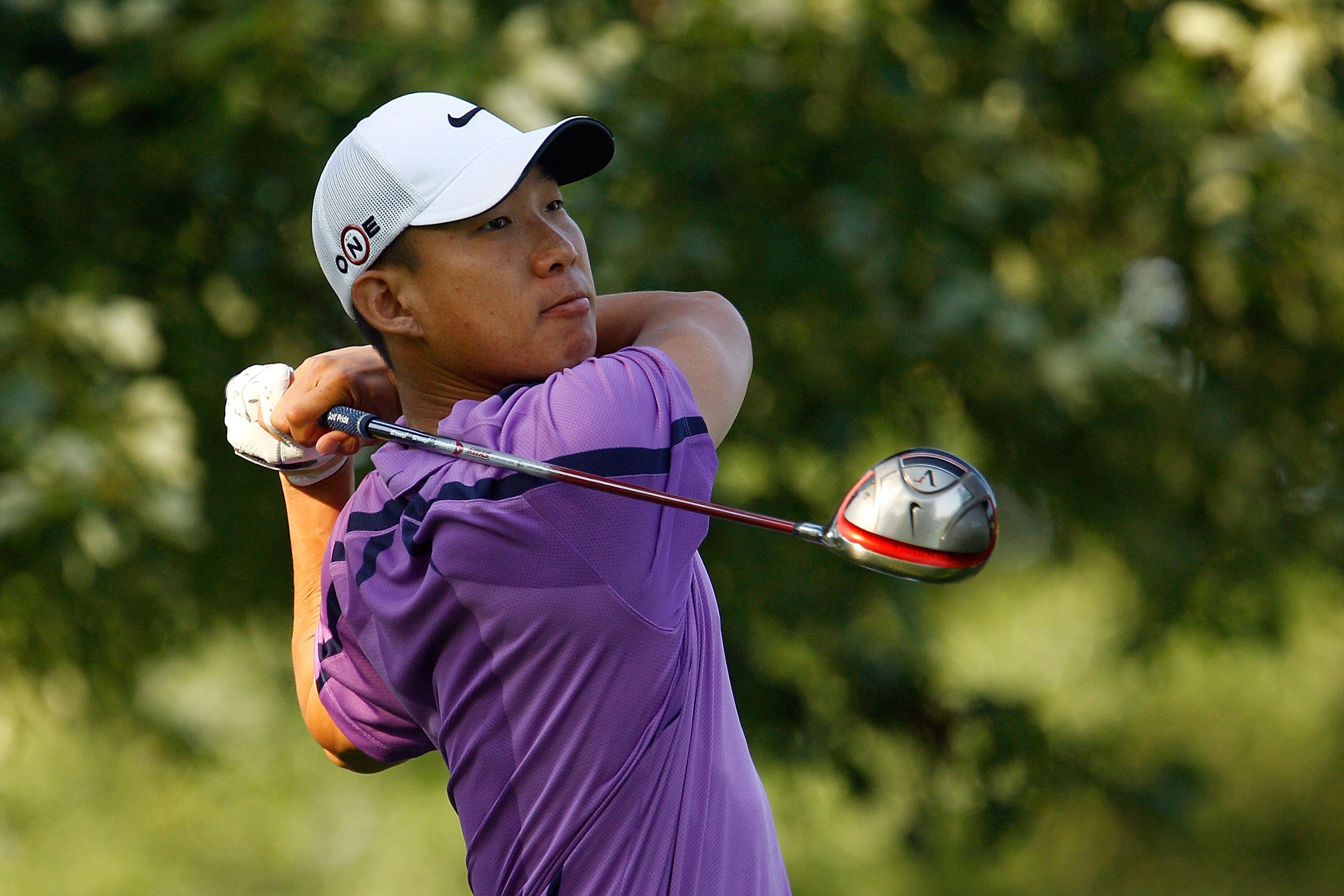 PARAMUS, NJ - AUGUST 26:  Anthony Kim watches his tee shot on the 11th hole during the first round of The Barclays at the Ridgewood Country Club on August 26, 2010 in Paramus, New Jersey.  (Photo by Scott Halleran/Getty Images)