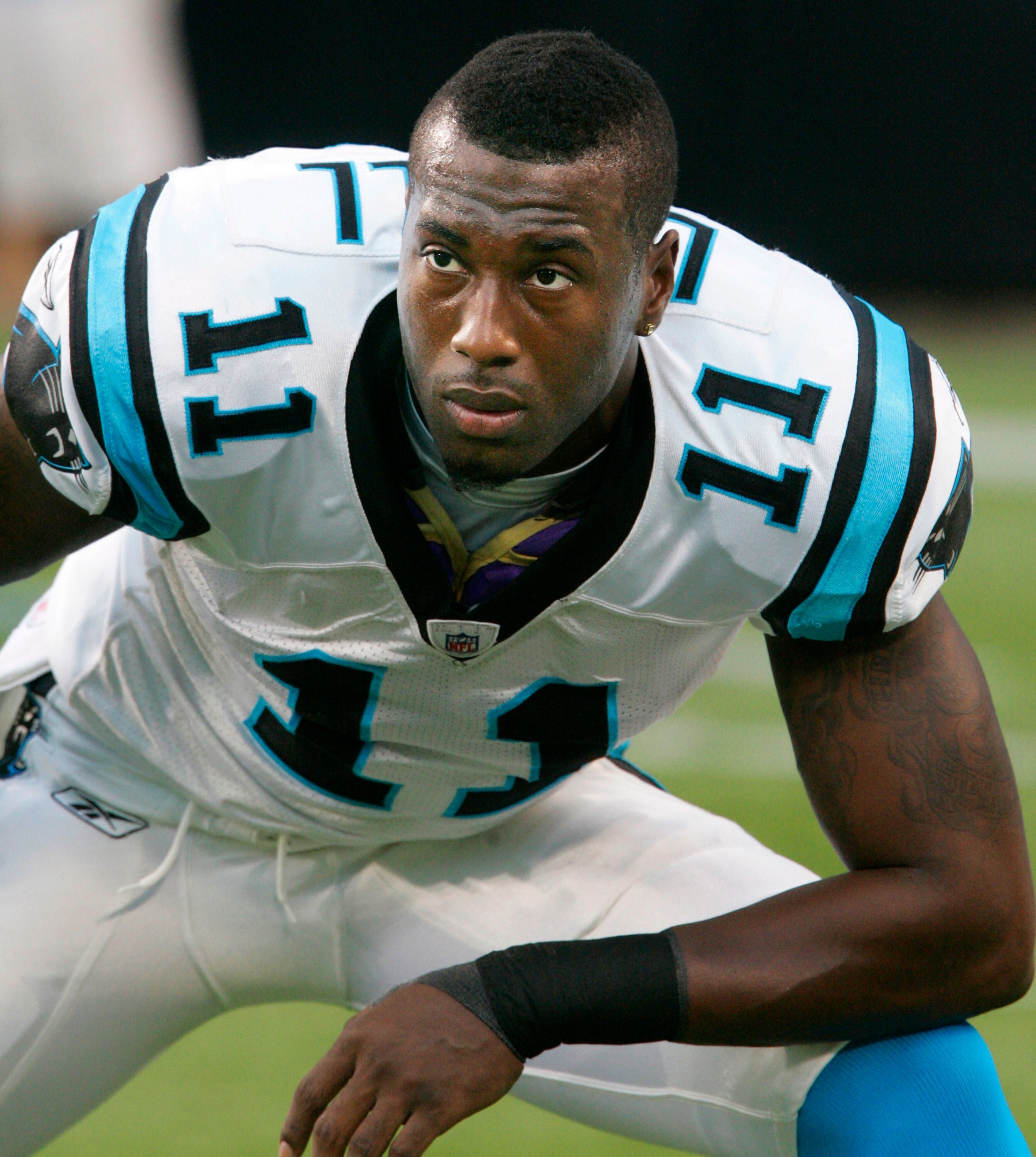 CHARLOTTE, NC - AUGUST 21:  Wide receiver Brandon LaFell #11 of the Carolina Panthers stretches before the start their preseason game against the New York Jets at Bank of America Stadium on August 21, 2010 in Charlotte, North Carolina. (Photo by Mary Ann
