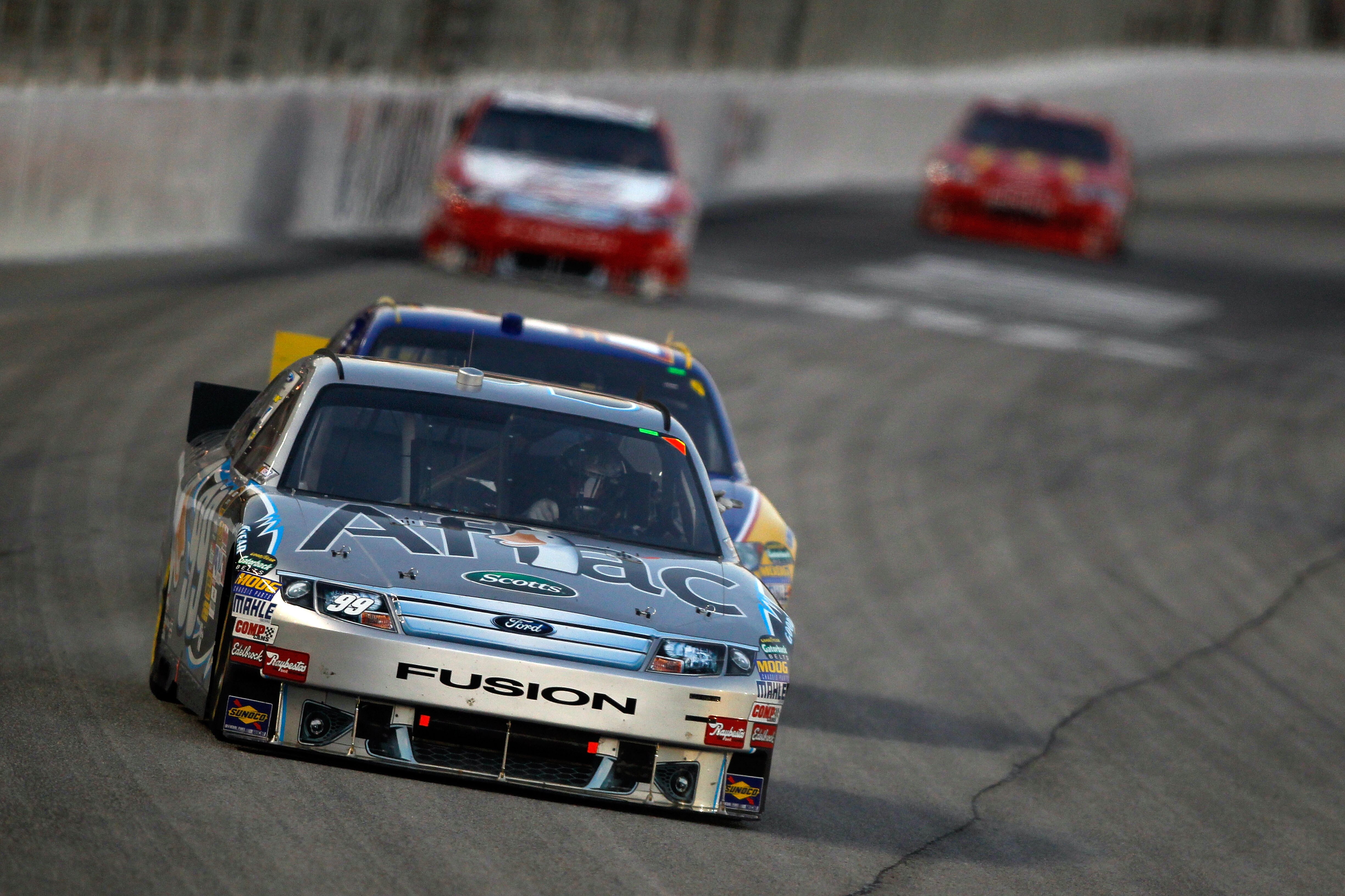 HAMPTON, GA - SEPTEMBER 05:  Carl Edwards, driver of the #99 Aflac Ford, leads a group of cars during the NASCAR Sprint Cup Series Emory Healthcare 500 at Atlanta Motor Speedway on September 5, 2010 in Hampton, Georgia.  (Photo by Todd Warshaw/Getty Image