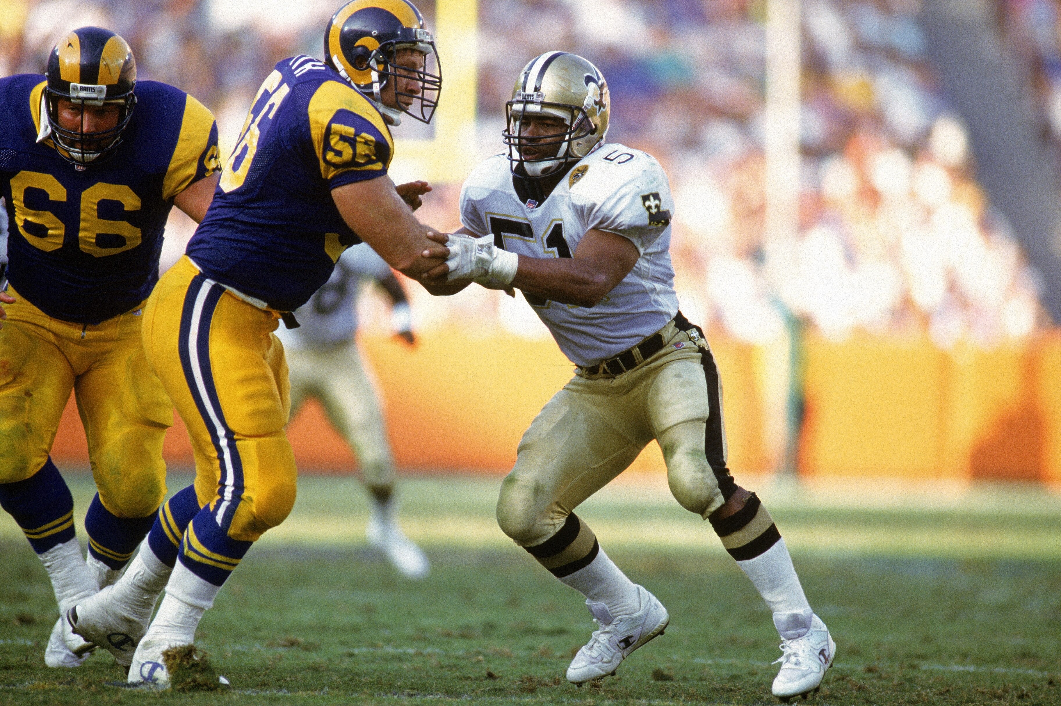 ANAHEIM, CA - NOVEMBER 3:  Linebacker Sam Mills #51 of the New Orleans Saints moves around the defense during an NFL game on November 3, 1991 against the Los Angeles Rams at Anaheim Stadium in Anaheim, California. The Saints defeated the Rams 24-17. (Phot
