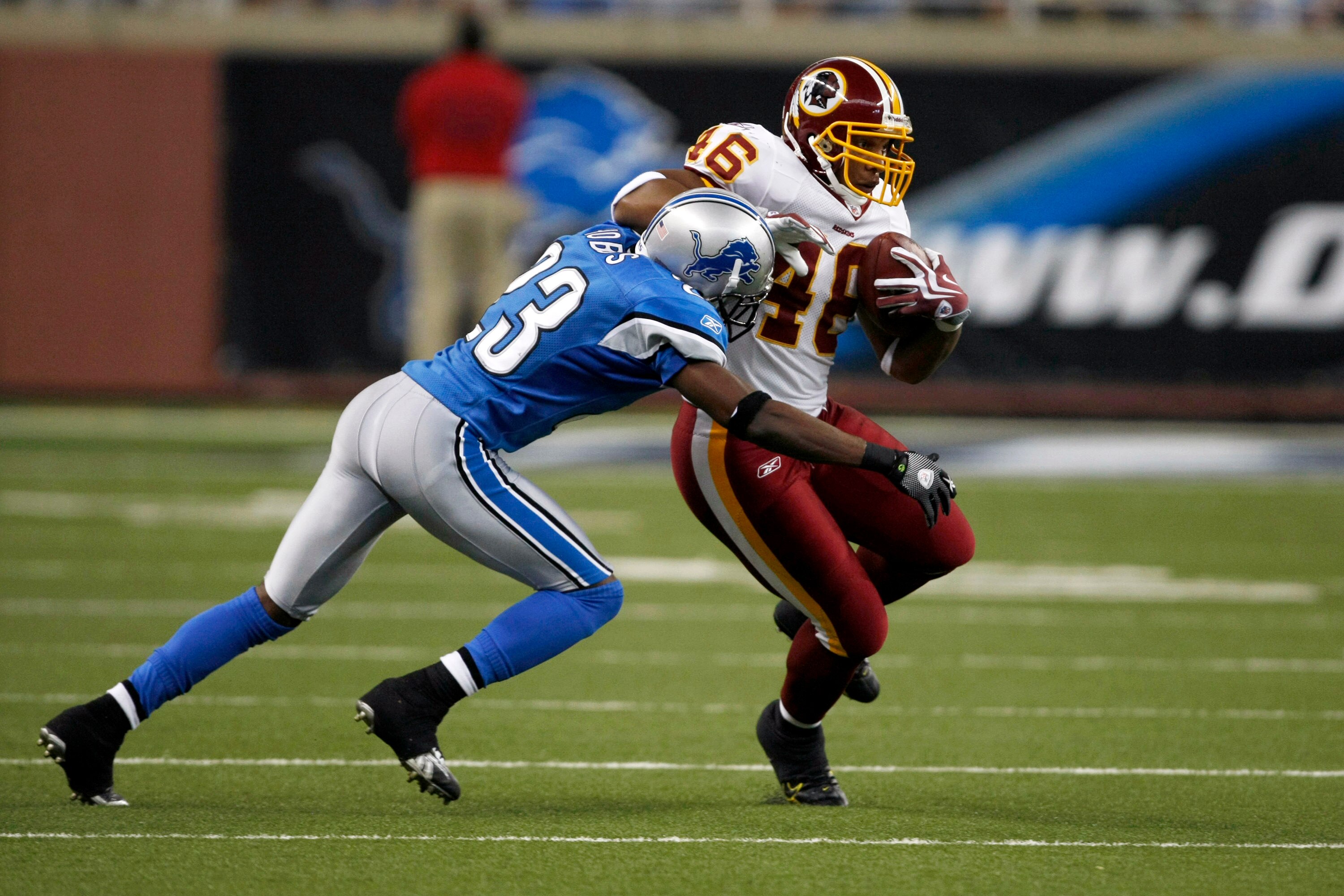 DETROIT, MI - SEPTEMBER 27: Running back Ladell Betts #46 of the Washington Redskins runs with the football as he is tackled by Kevin Hobbs #23 of the Detroit Lions at Ford Field on September 27, 2009 in Detroit, Michigan. The Lions defeated the Redskins 