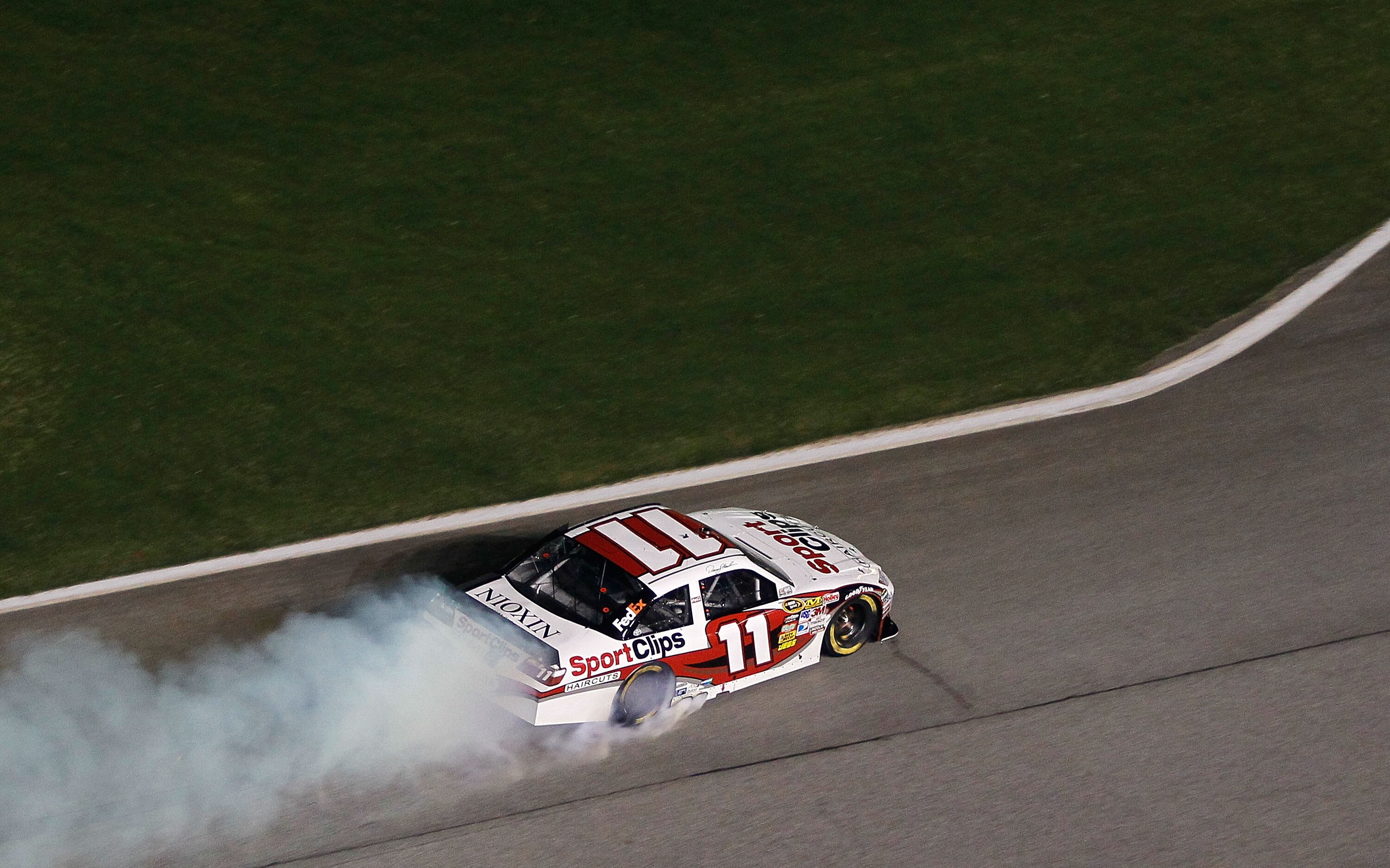 HAMPTON, GA - SEPTEMBER 05:  Denny Hamlin drives the #11 Sport Clips Toyota after he spun out in the NASCAR Sprint Cup Series Emory Healthcare 500 at Atlanta Motor Speedway on September 5, 2010 in Hampton, Georgia.  (Photo by Kevin C. Cox/Getty Images)
