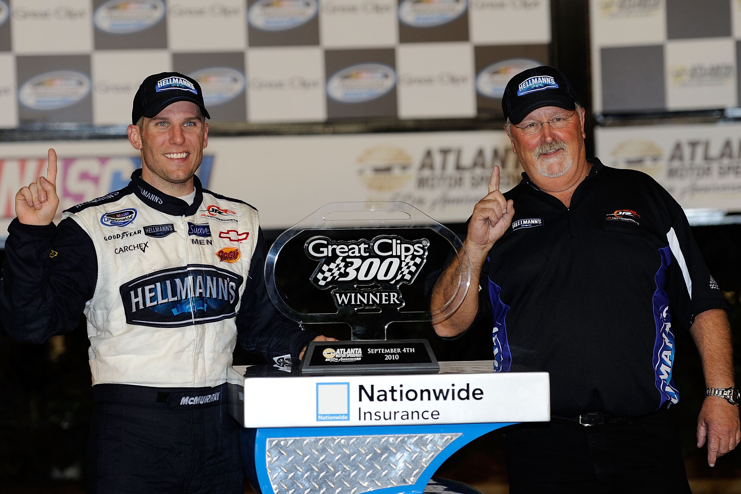 HAMPTON, GA - SEPTEMBER 04:  Jamie McMurray (L), driver of the #88 Hellman's/BJ's Chevrolet, and crew chief Tony Eury Sr. pose in Victory Lane after winning the NASCAR Nationwide Series Great Clips 300 at Atlanta Motor Speedway on September 4, 2010 in Ham