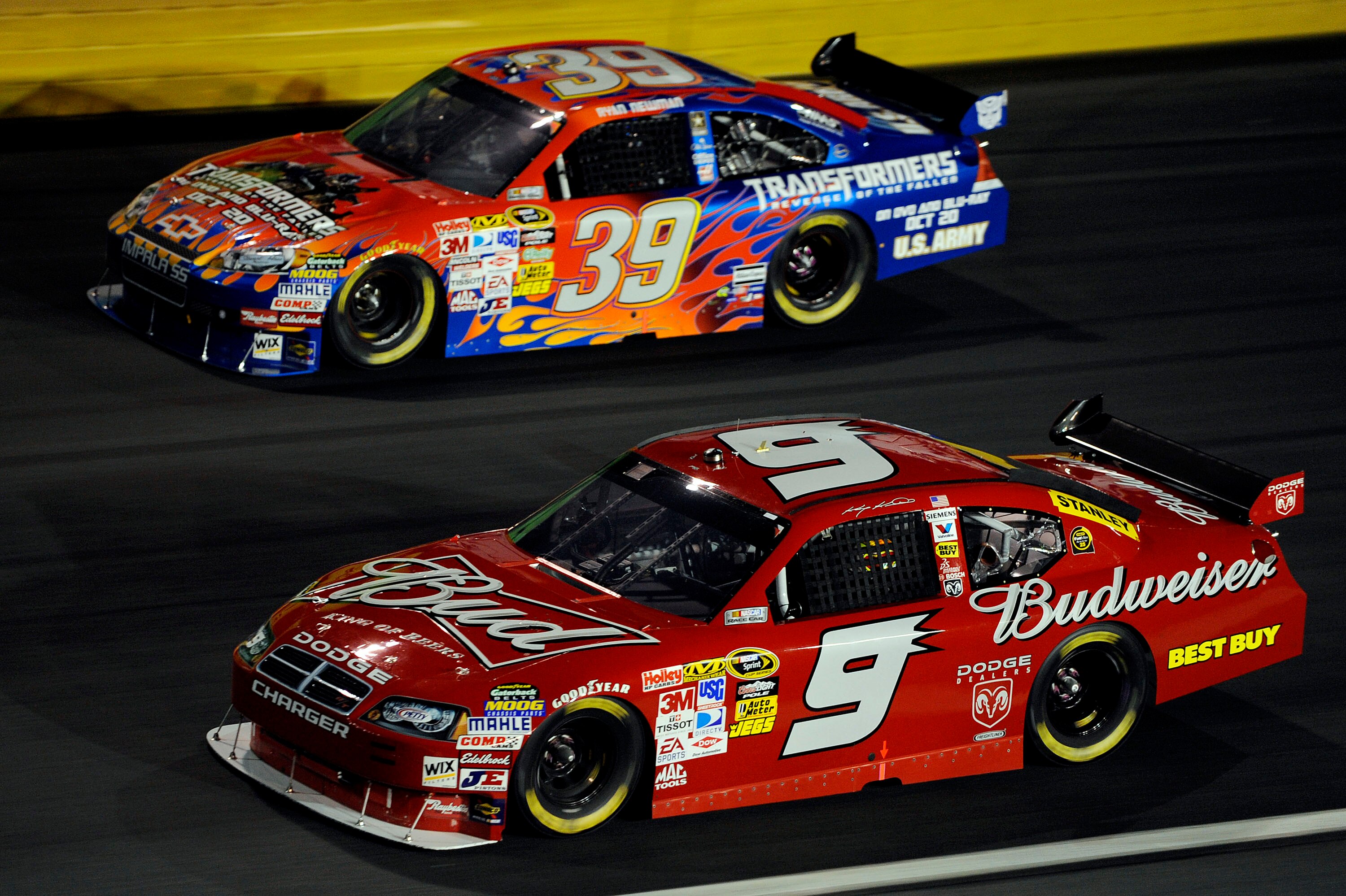 CONCORD, NC - OCTOBER 17:  Ryan Newman, driver of the #39 Transformers Chevrolet, races Kasey Kahne, driver of the #9 Budweiser Dodge, during the NASCAR Sprint Cup Series NASCAR Banking 500 at Lowe's Motor Speedway on October 17, 2009 in Concord, North Ca