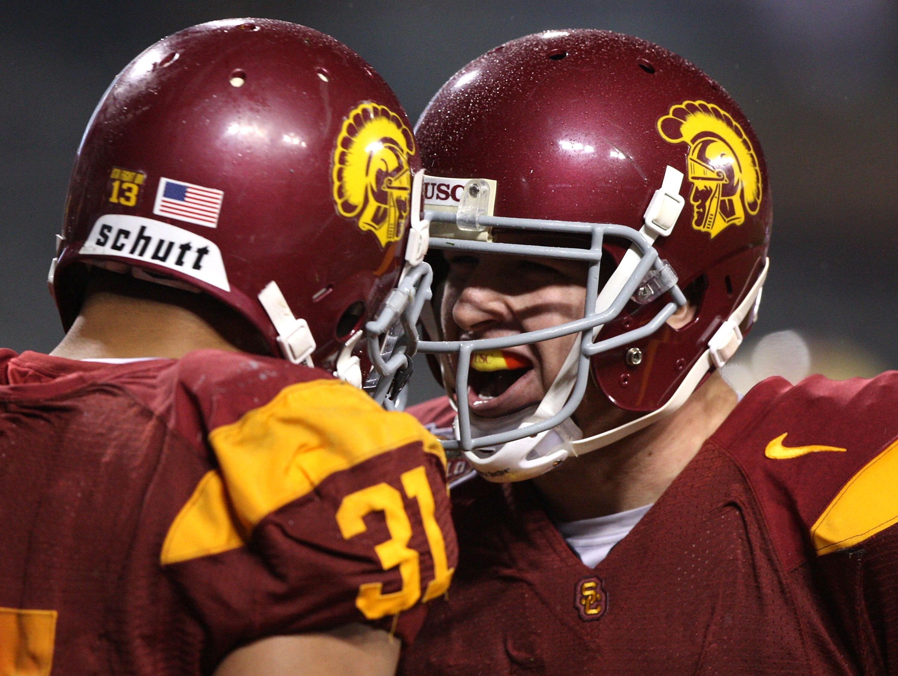 SAN FRANCISCO - DECEMBER 26: Matt Barkley #7 of the USC Trojans celebrates with Stanley Havili #31 after scoring a touchdown in the second quarter against the Boston College Eagles during the 2009 Emerald Bowl at AT&T Park on December 26, 2009 in San Fran