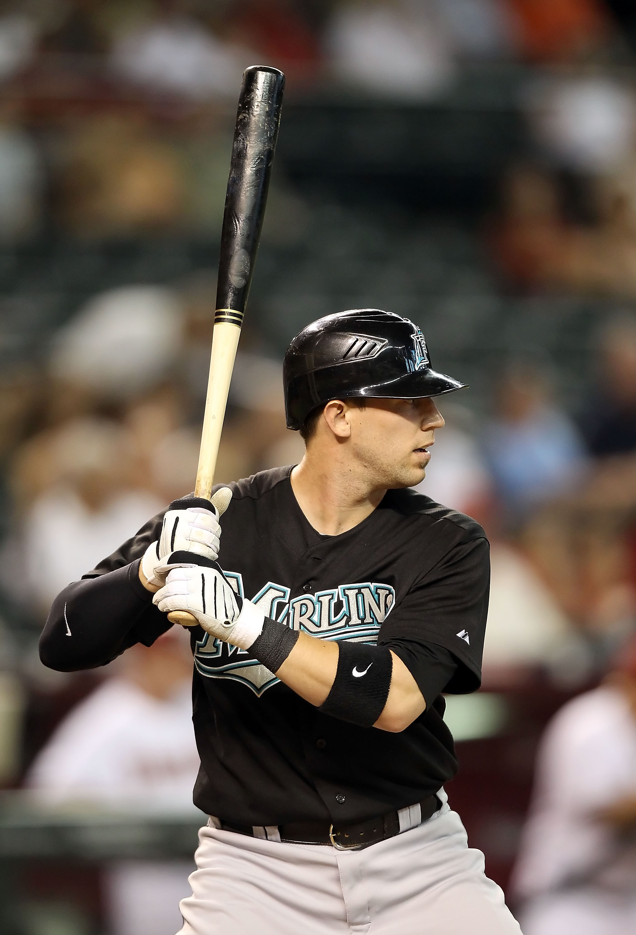 PHOENIX - JULY 08:  Brett Hayes #9 of the Florida Marlins bats against the Arizona Diamondbacks during the Major League Baseball game at Chase Field on July 8, 2010 in Phoenix, Arizona. The Diamondbacks defeated the Marlins 10-4.  (Photo by Christian Pete