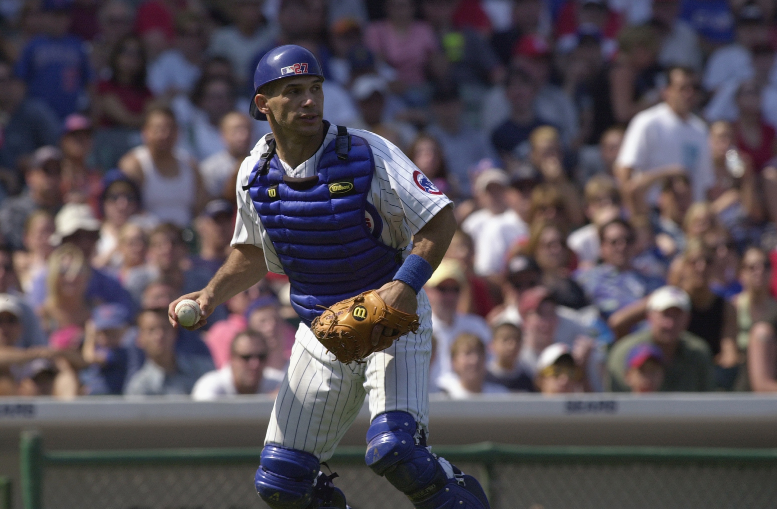CHICAG0, IL - AUGUST 31: Catcher Joe Girardi #27 of the Chicago Cubs eyes the runner as he readies to throw against the St. Louis Cardinals on August 31, 2002 at Wrigley Field in Chicago, Illinois. The Cardinals defeated the Cubs 8-1. (Photo by Jonatha CHICAG0, IL - AUGUST 31: Catcher Joe Girardi #27 of the Chicago Cubs eyes the runner as he readies to throw against the St. Louis Cardinals on August 31, 2002 at Wrigley Field in Chicago, Illinois. The Cardinals defeated the Cubs 8-1. (Photo by Jonatha