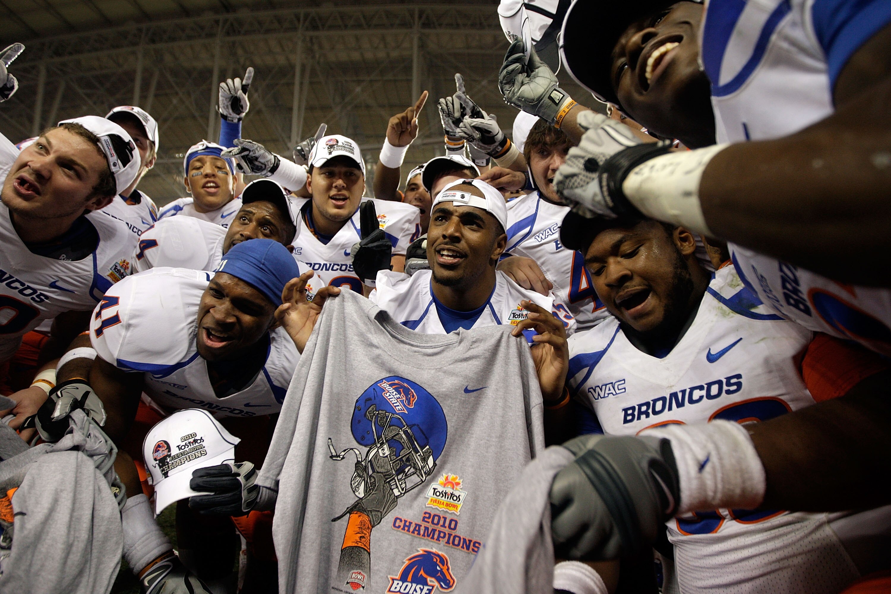 GLENDALE, AZ - JANUARY 04: The Boise State Broncos celebrate after defeating the TCU Horned Frogs 17-10 during the Tostitos Fiesta Bowl at the Universtity of Phoenix Stadium on January 4, 2010 in Glendale, Arizona. (Photo by Jamie Squire/Getty Images) GLENDALE, AZ - JANUARY 04: The Boise State Broncos celebrate after defeating the TCU Horned Frogs 17-10 during the Tostitos Fiesta Bowl at the Universtity of Phoenix Stadium on January 4, 2010 in Glendale, Arizona. (Photo by Jamie Squire/Getty Images)