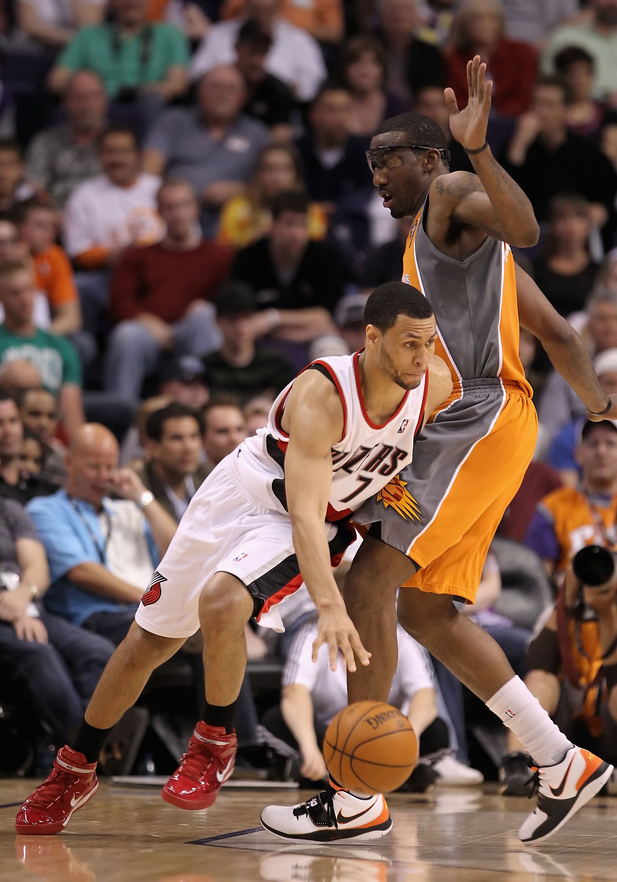 PHOENIX - MARCH 21:  Brandon Roy #1 of the Portland Trail Blazers drives the ball against Amar'e Stoudemire #1 of the Phoenix Suns during the NBA game at US Airways Center on March 21, 2010 in Phoenix, Arizona. The Suns defeated the Trail Blazers 93-87.