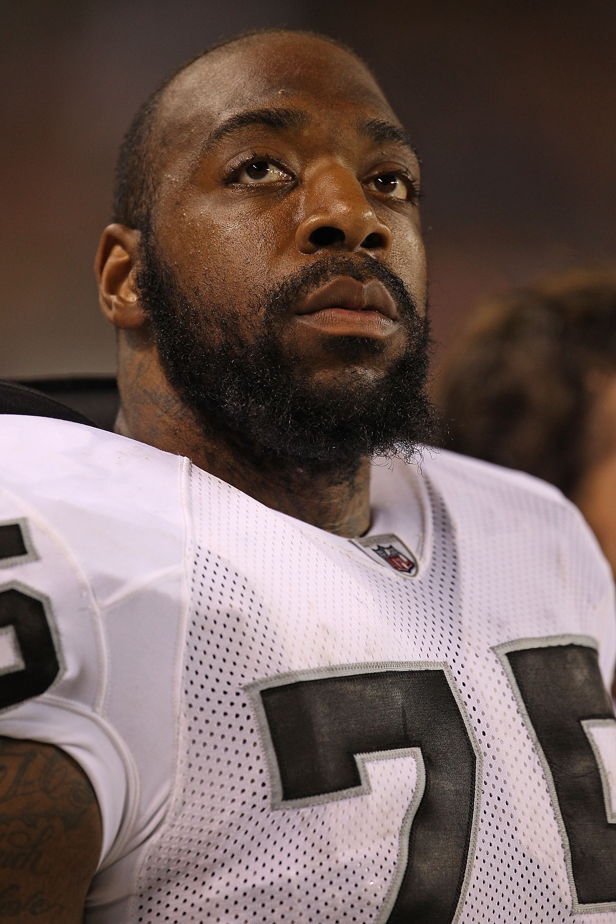 CHICAGO - AUGUST 21: Mario Henderson #75 of the Oakland Raiders watches as his teammates take on  the Chicago Bears during a preseason game at Soldier Field on August 21, 2010 in Chicago, Illinois. The Raiders defeated the Bears 32-17. (Photo by Jonathan