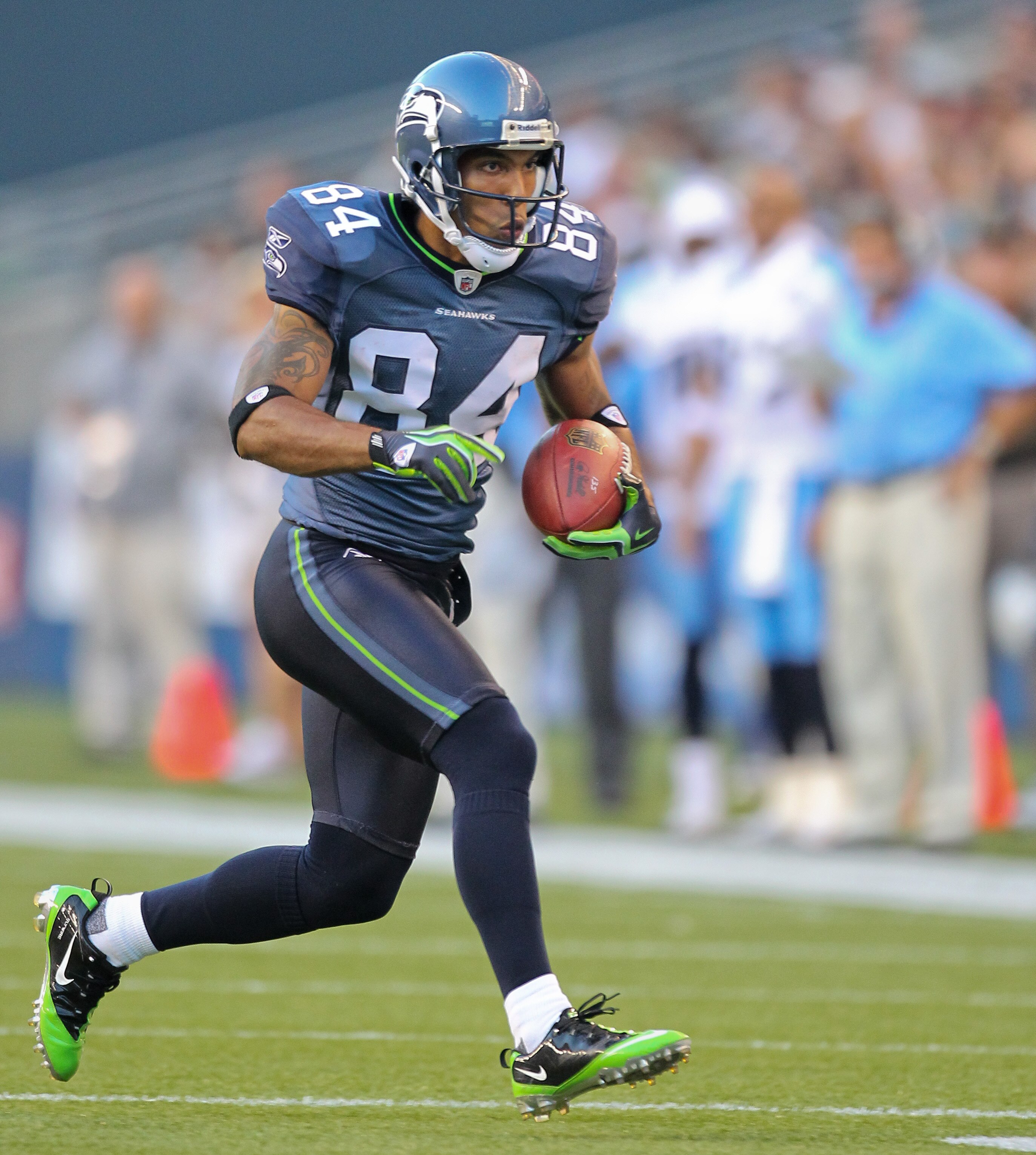 SEATTLE - AUGUST 14:  Wide receiver T.J. Houshmandzadeh #84 of the Seattle Seahawks rushes during the preseason game against  the Tennessee Titans at Qwest Field on August 14, 2010 in Seattle, Washington. (Photo by Otto Greule Jr/Getty Images)