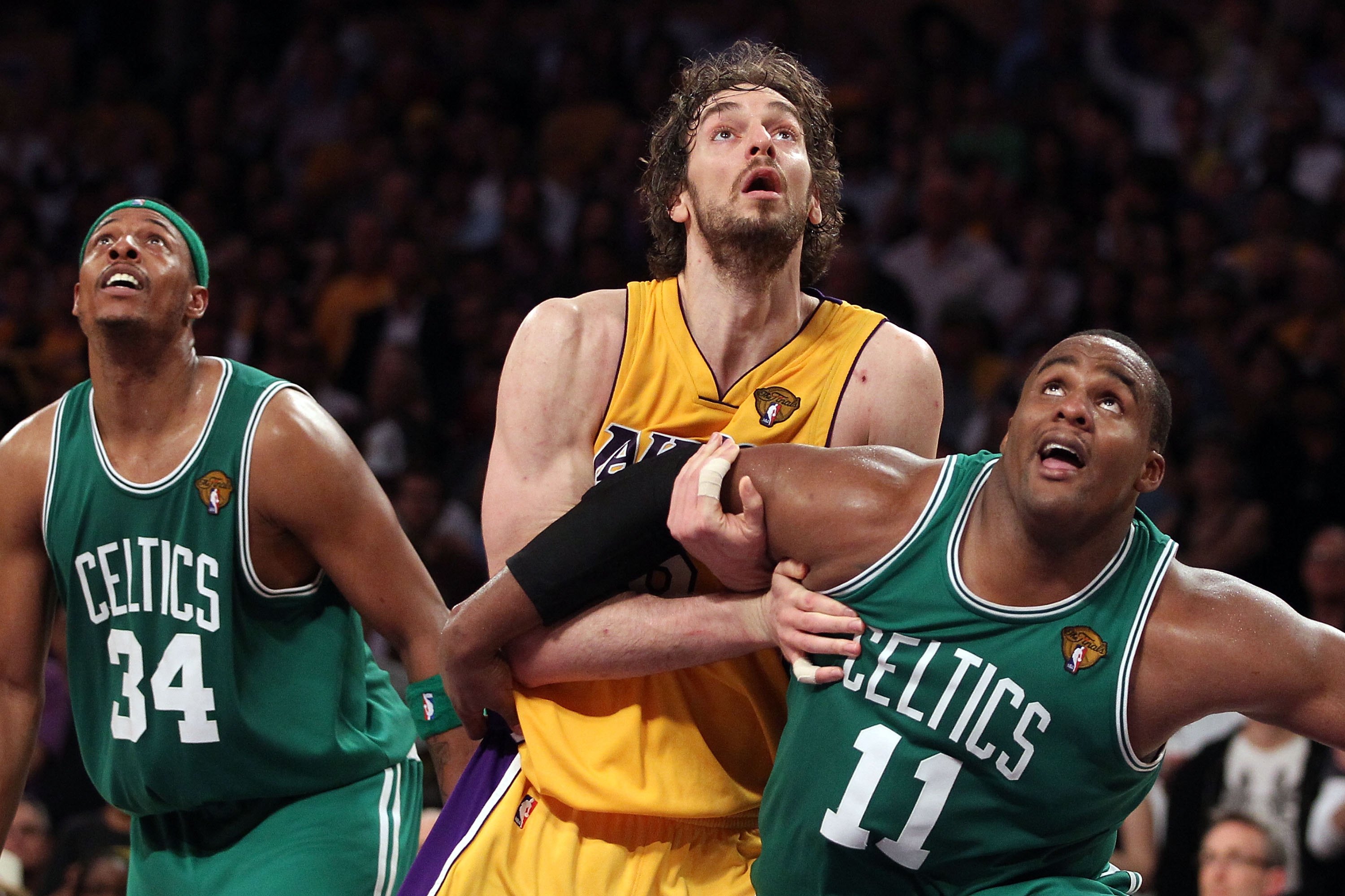 LOS ANGELES, CA - JUNE 17:  Glen Davis #11 and Paul Pierce #34 of the Boston Celtics box out Pau Gasol #16 of the Los Angeles Lakers in Game Seven of the 2010 NBA Finals at Staples Center on June 17, 2010 in Los Angeles, California.  NOTE TO USER: User ex