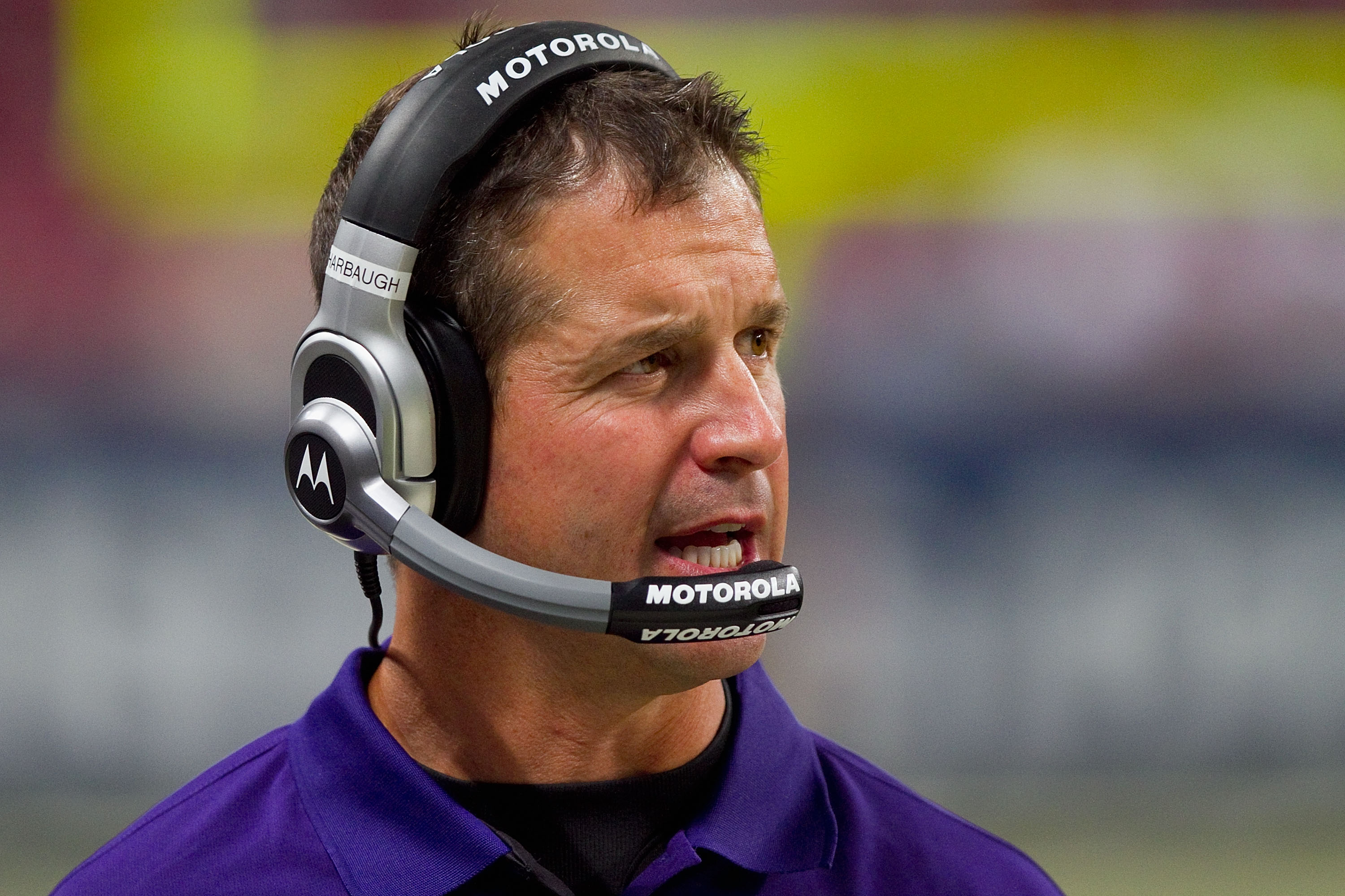 ST. LOUIS - SEPTEMBER 2: Head coach John Harbaugh of the Baltimore Ravens looks on from the sideline against the St. Louis Rams during an NFL preseason game at the Edward Jones Dome on September 2, 2010 in St. Louis, Missouri.  The Rams beat the Ravens 27