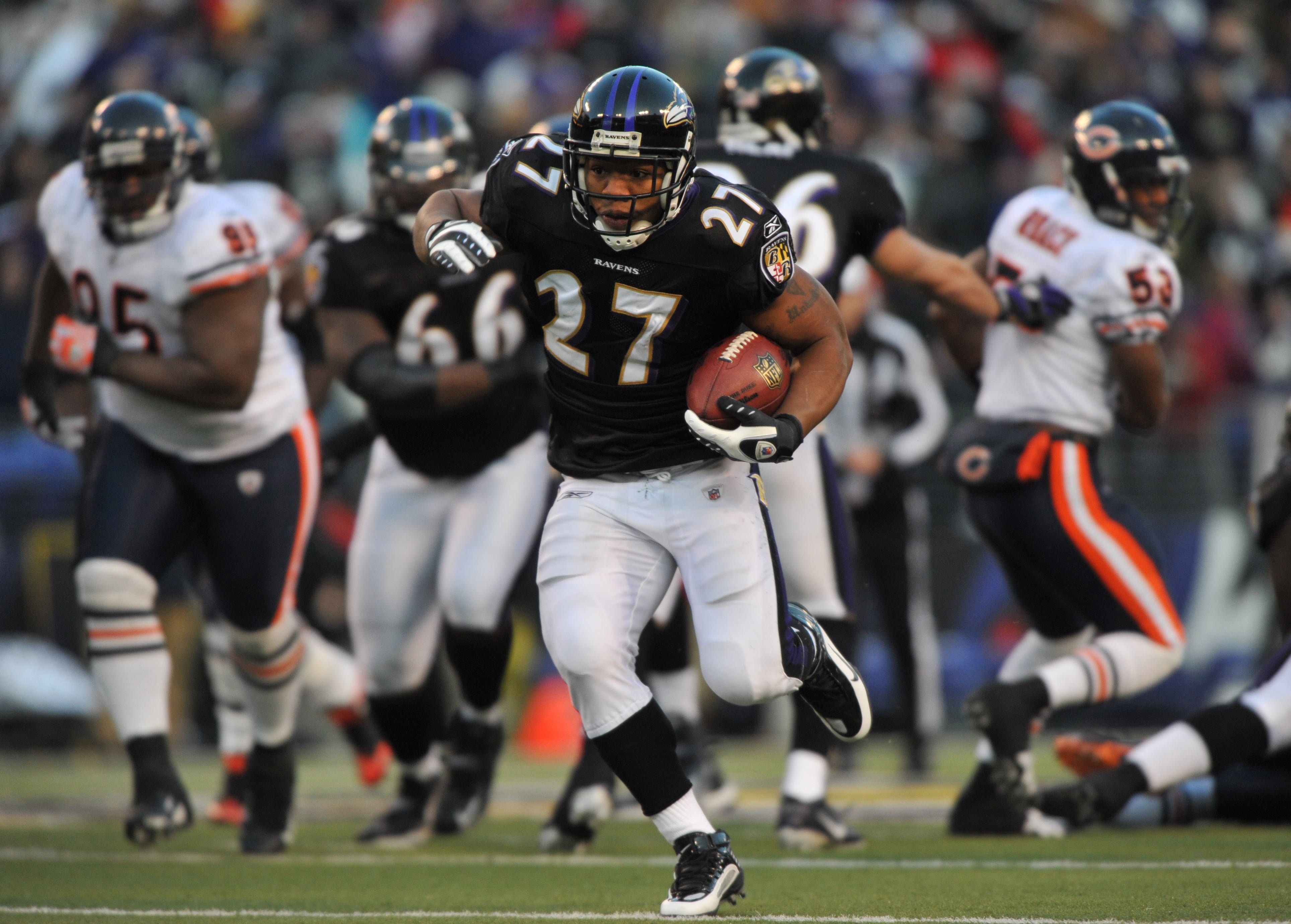 BALTIMORE - DECEMBER 20:  Ray Rice #27 of the Baltimore Ravens runs the ball during the game against the Chicago Bears at M&T Bank Stadium on December 20, 2009 in Baltimore, Maryland. The Ravens defeated the Bears 31-7. (Photo by Larry French/Getty Images