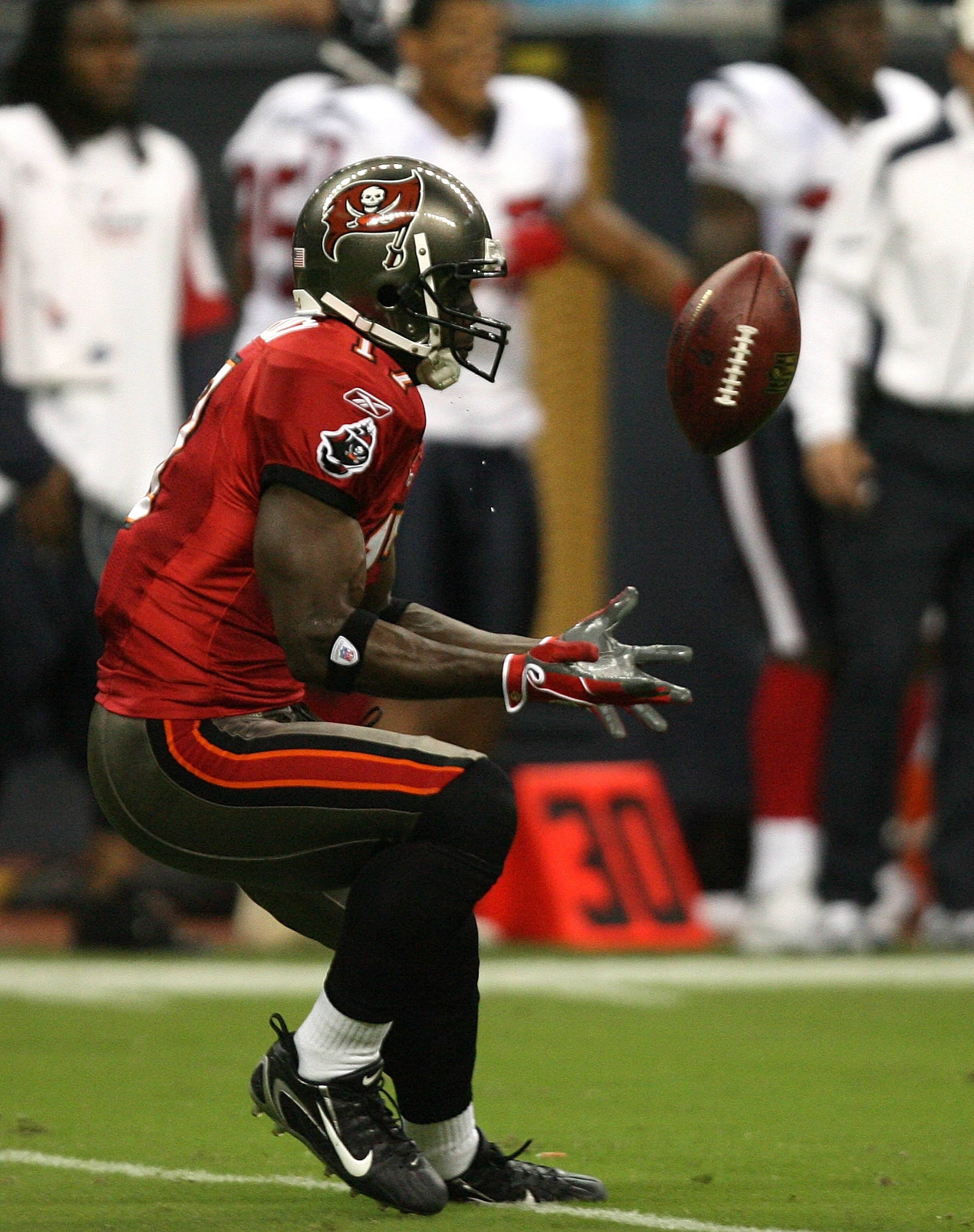 HOUSTON - AUGUST 28:  Punt returner Michael Spurlock #17 fumbles the kick return in the 3rd quarter Aug. 28, 2008 at Reliant Stadium in Houston, Texas.  (Photo by Bob Levey/Getty Images)