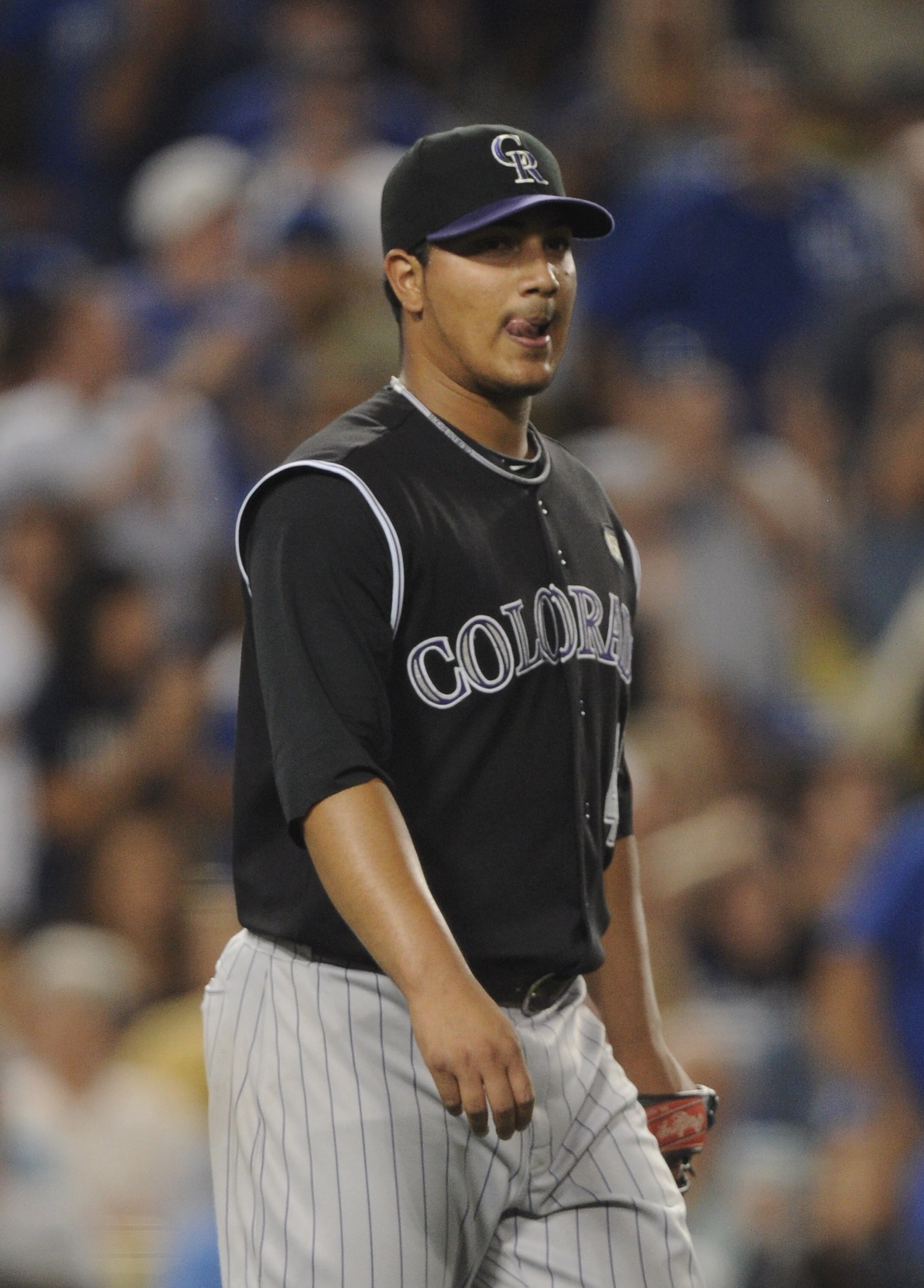LOS ANGELES, CA - AUGUST 17:  Jhoulys Chacin #45 of the Colorado Rockies reacts after allowing a fifth run to the Los Angeles Dodgers during the fifth inning at Dodger Stadium on August 17, 2010 in Los Angeles, California.  (Photo by Harry How/Getty Image