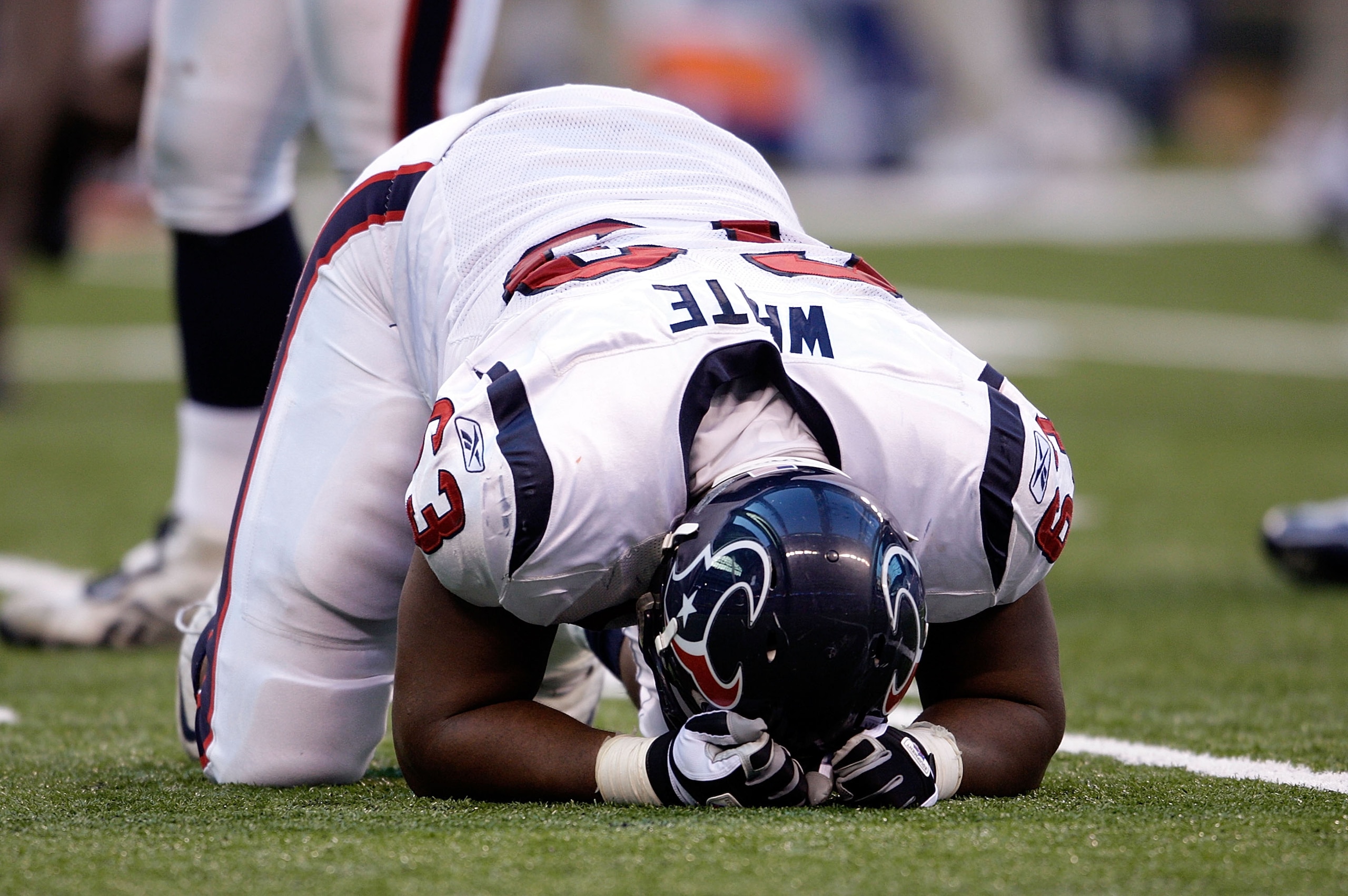 INDIANAPOLIS - NOVEMBER 08:  Chris White #63 of the Houston Texans reacts as the Texans miss a field goal as time expired during the NFL game against the Indianapolis Colts at Lucas Oil Stadium on November 8, 2009 in Indianapolis, Indiana. The Colts won 2