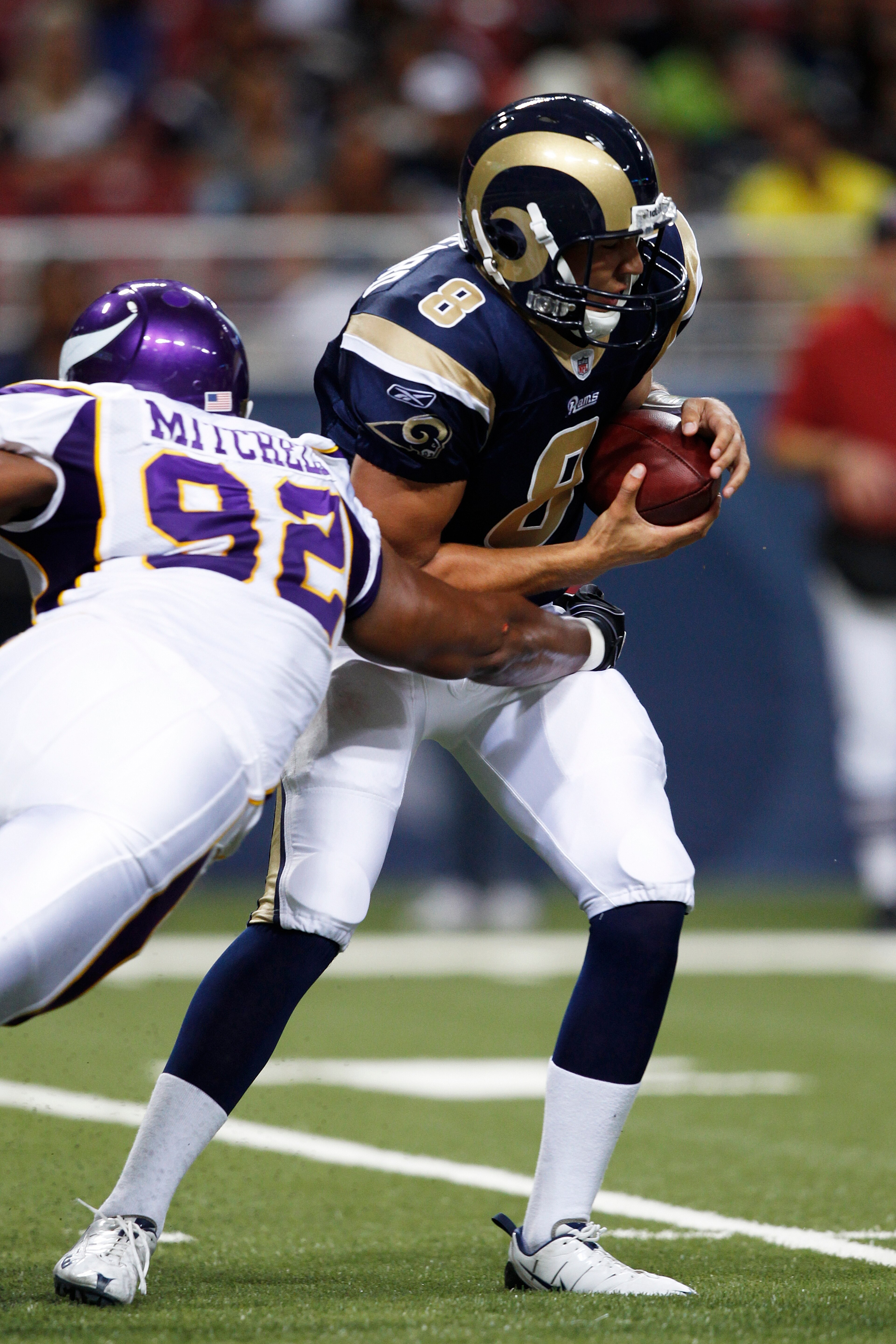 ST. LOUIS, MO - AUGUST 14: Sam Bradford #8 of the St. Louis Rams gets sacked by Jayme Mitchell #92 of the Minnesota Vikings during the preseason game at Edward Jones Dome on August 14, 2010 in St. Louis, Missouri. (Photo by Joe Robbins/Getty Images)