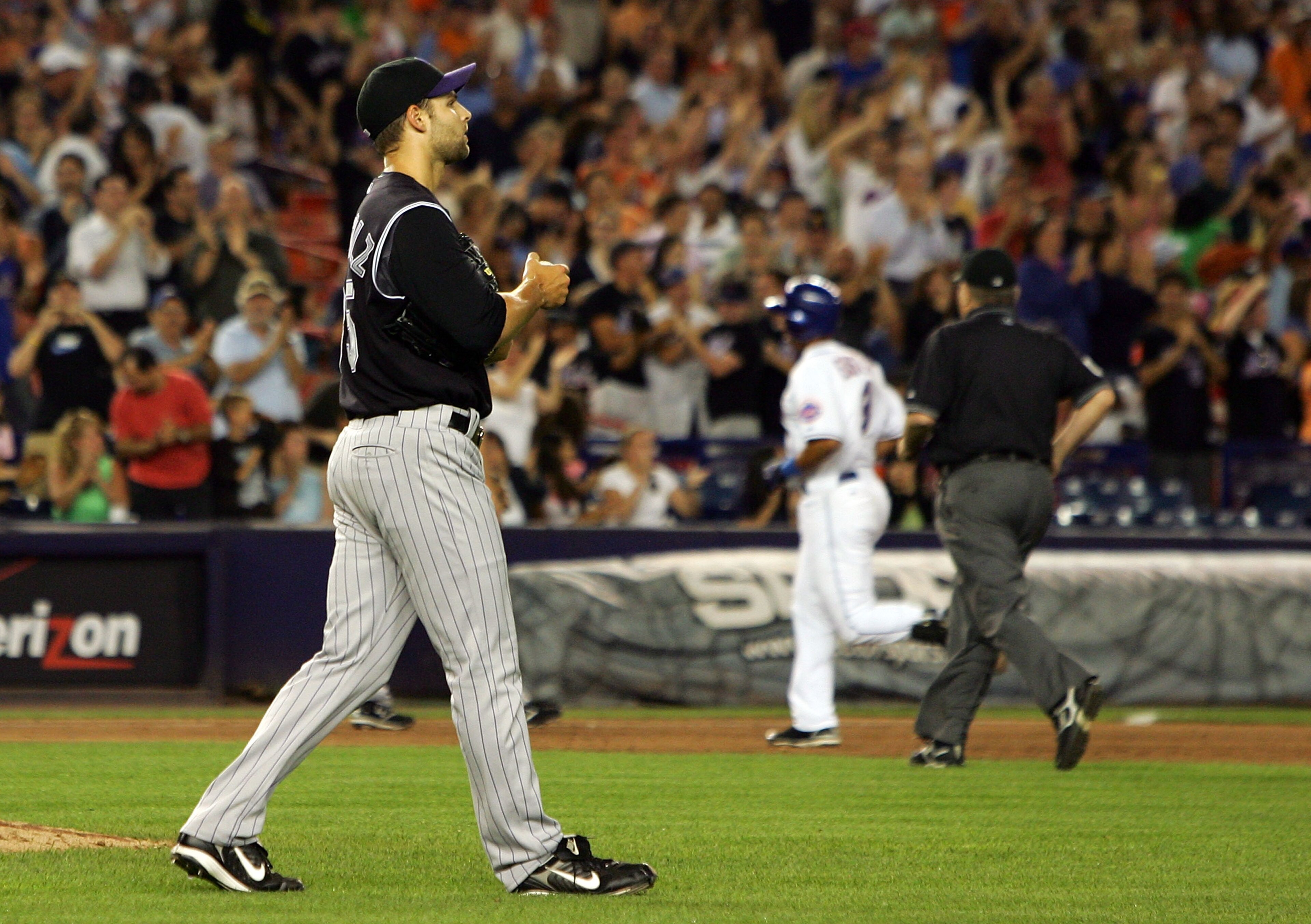 NEW YORK - JULY 11:  Taylor Buchholz #35 of the Colorado Rockies looks on after surrendering an eighth inning home run to Damion Easley #3 on July 11, 2008 at Shea Stadium in the Flushing neighborhood of the Queens borough of New York City.  (Photo by Jim
