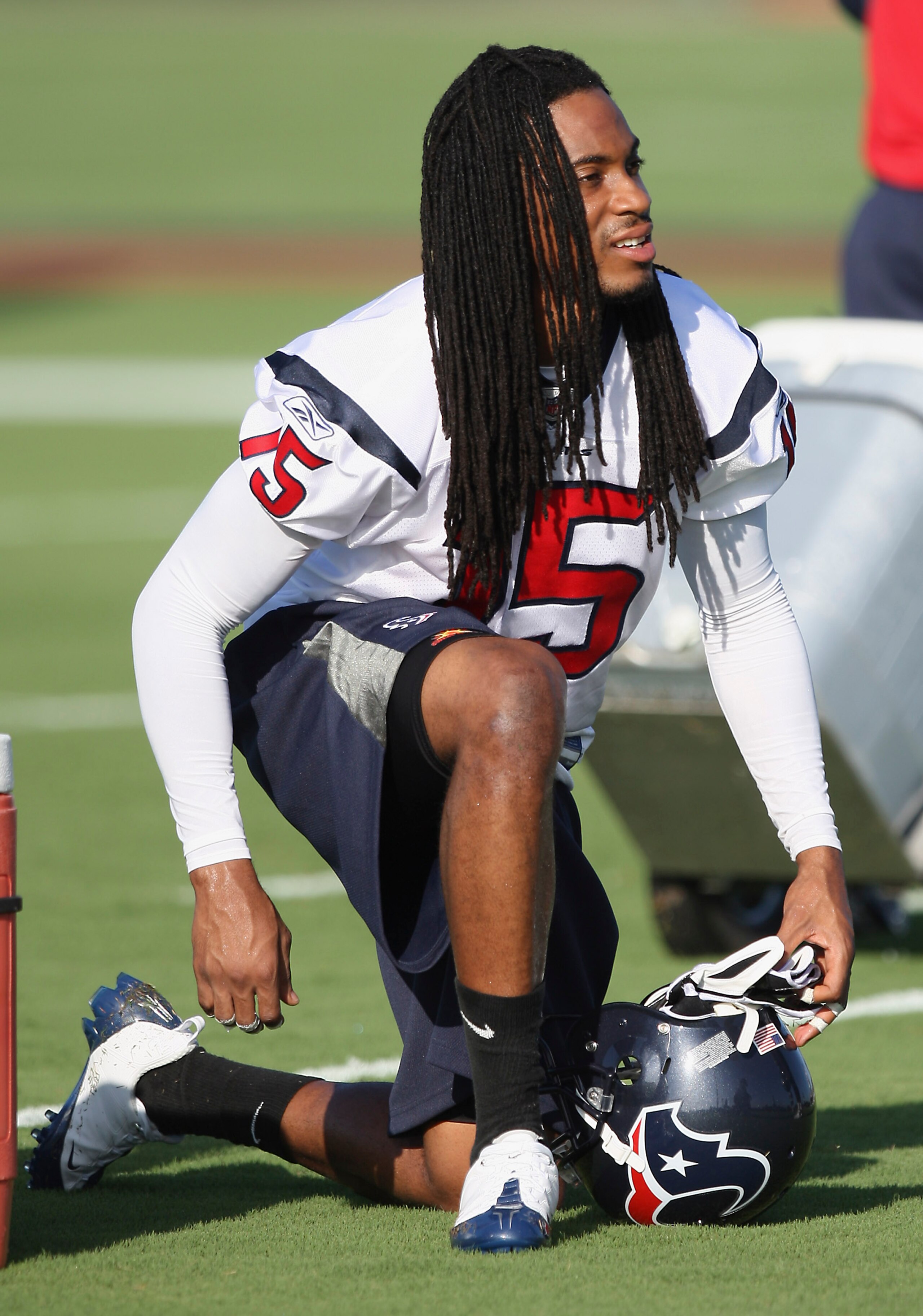 HOUSTON - JULY 30:  Wide receiver Bobby Williams #15 of the Houston Texans takes a knee between plays during the team's first NFL training camp practice of the season at Reliant Park on July 30, 2010 in Houston, Texas.  (Photo by Bob Levey/Getty Images)