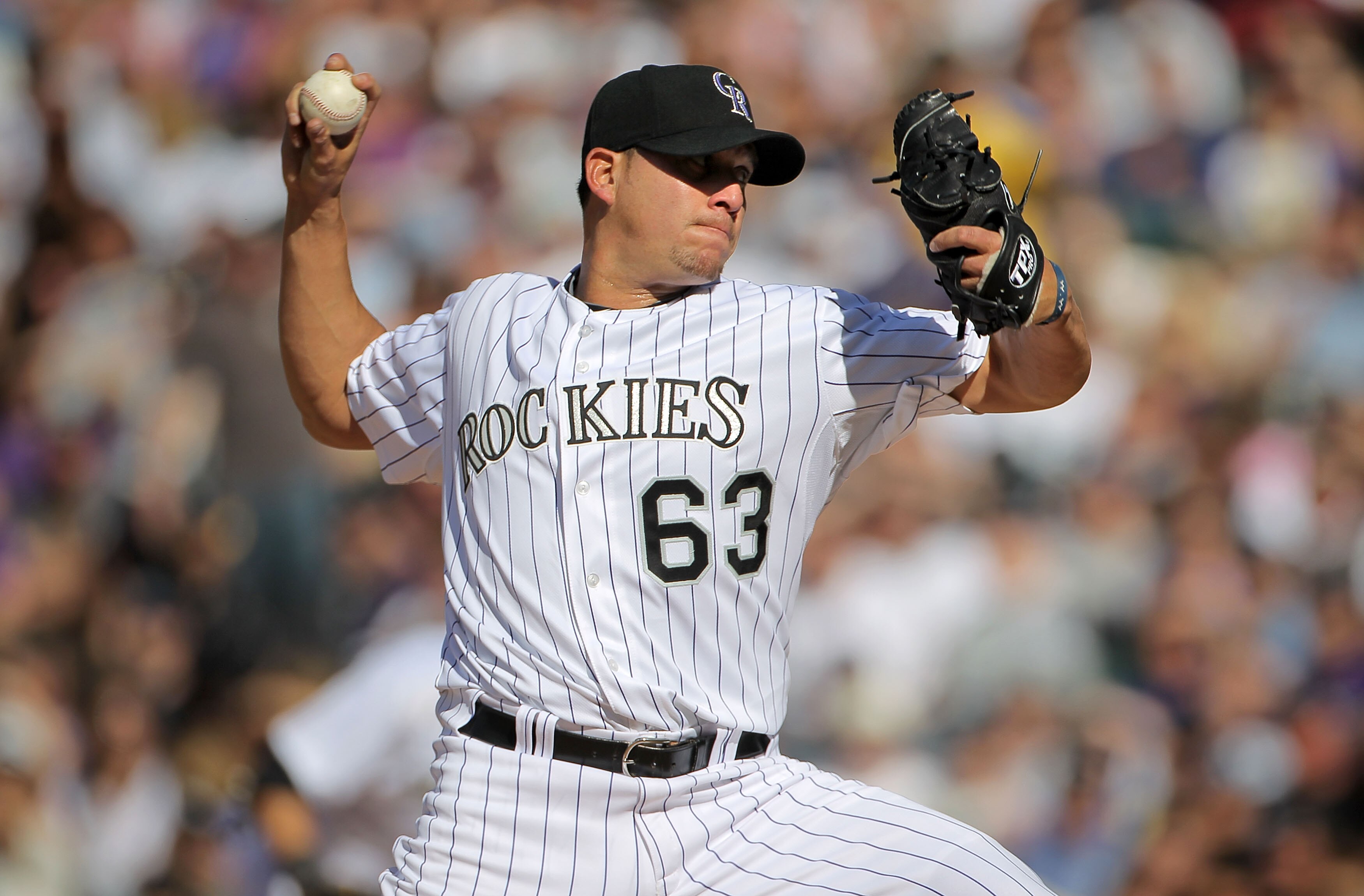 DENVER - APRIL 09:  Relief pitcher Rafael Betancourt #63 of the Colorado Rockies delivers against the San Diego Padres in the ninth inning during MLB action on Opening Day at Coors Field on April 9, 2010 in Denver, Colorado. The Rockies defeated the Padre