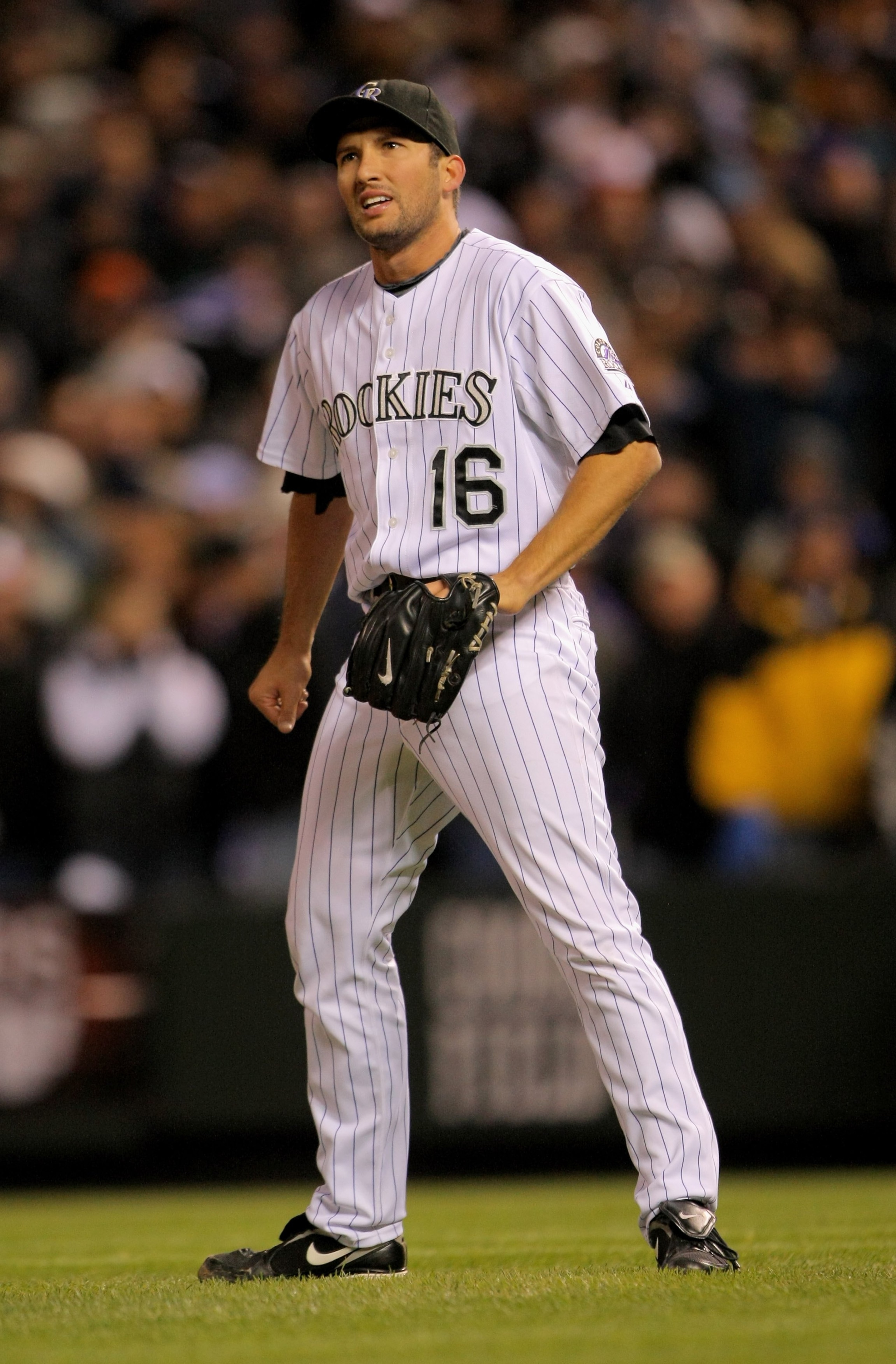 DENVER - OCTOBER 12:  Pitcher Huston Street #16 of the Colorado Rockies reacts as he blows the save against the Philadelphia Phillies in the ninth inning in Game Four of the NLDS during the 2009 MLB Playoffs at Coors Field on October 12, 2009 in Denver, C