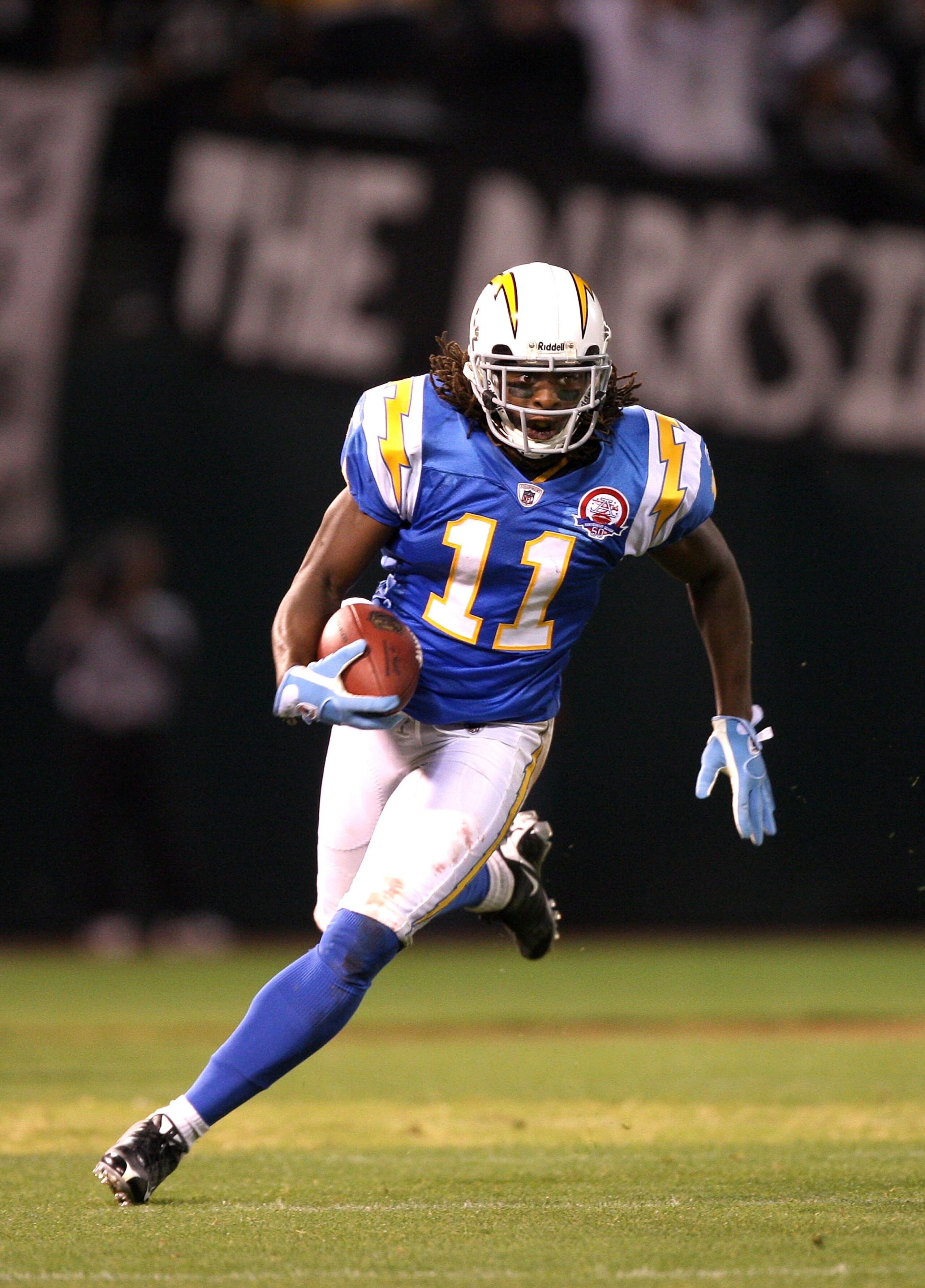 OAKLAND, CA - SEPTEMBER 14: Legedu Naanee #11 of the San Diego Chargers runs with the ball during their game against the Oakland Raiders on September 14, 2009 at the Oakland-Alameda County Coliseum in Oakland, California. (Photo by Ezra Shaw/Getty Image OAKLAND, CA - SEPTEMBER 14: Legedu Naanee #11 of the San Diego Chargers runs with the ball during their game against the Oakland Raiders on September 14, 2009 at the Oakland-Alameda County Coliseum in Oakland, California. (Photo by Ezra Shaw/Getty Image