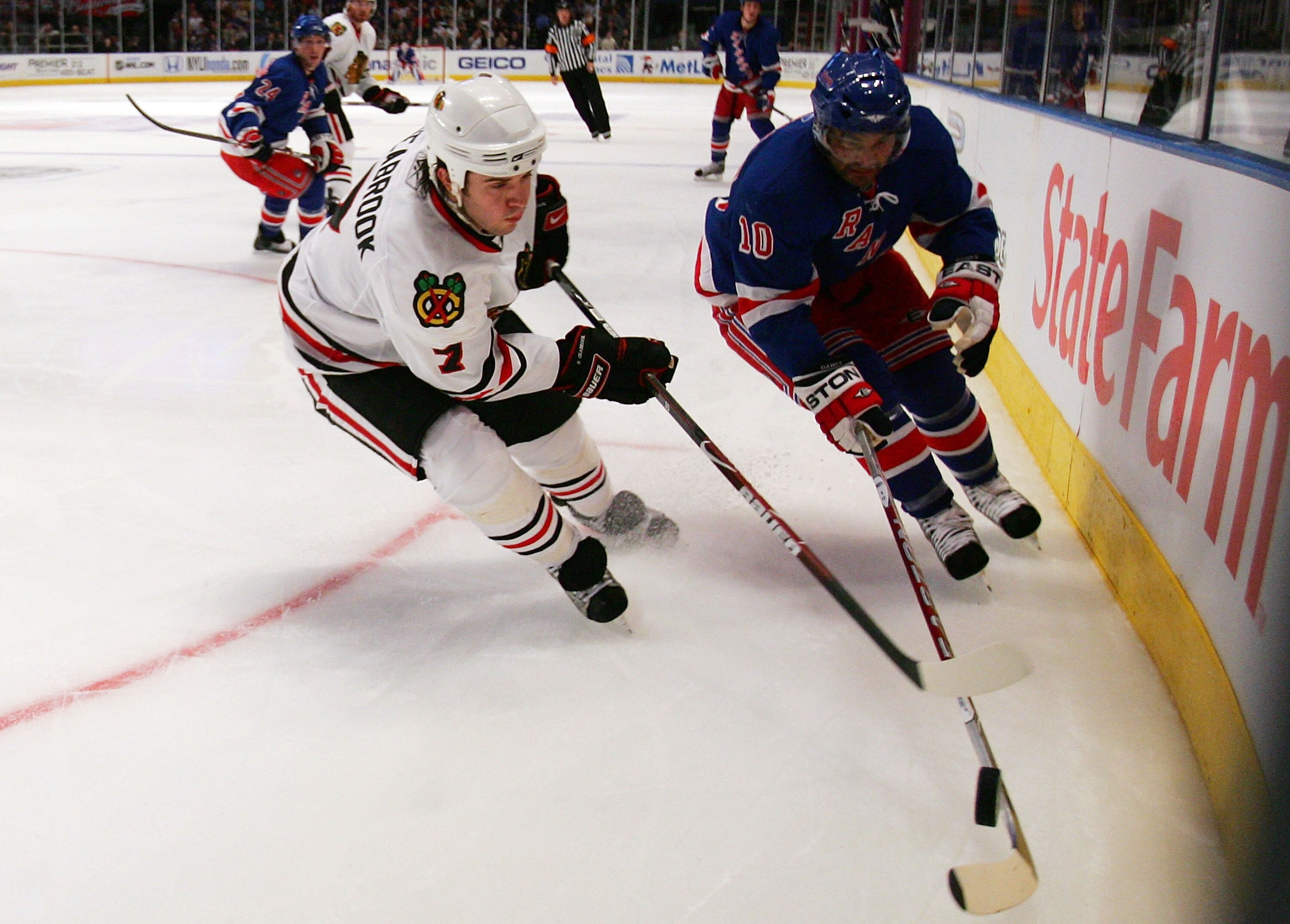 NEW YORK - OCTOBER 10:  Bre4nt Seabrook #7 of the Chicago Blackhawks defends against Nigel Dawes #10 of the New York Rangers on October 10, 2008 at Madison Square Garden in New York City.  (Photo by Jim McIsaac/Getty Images)