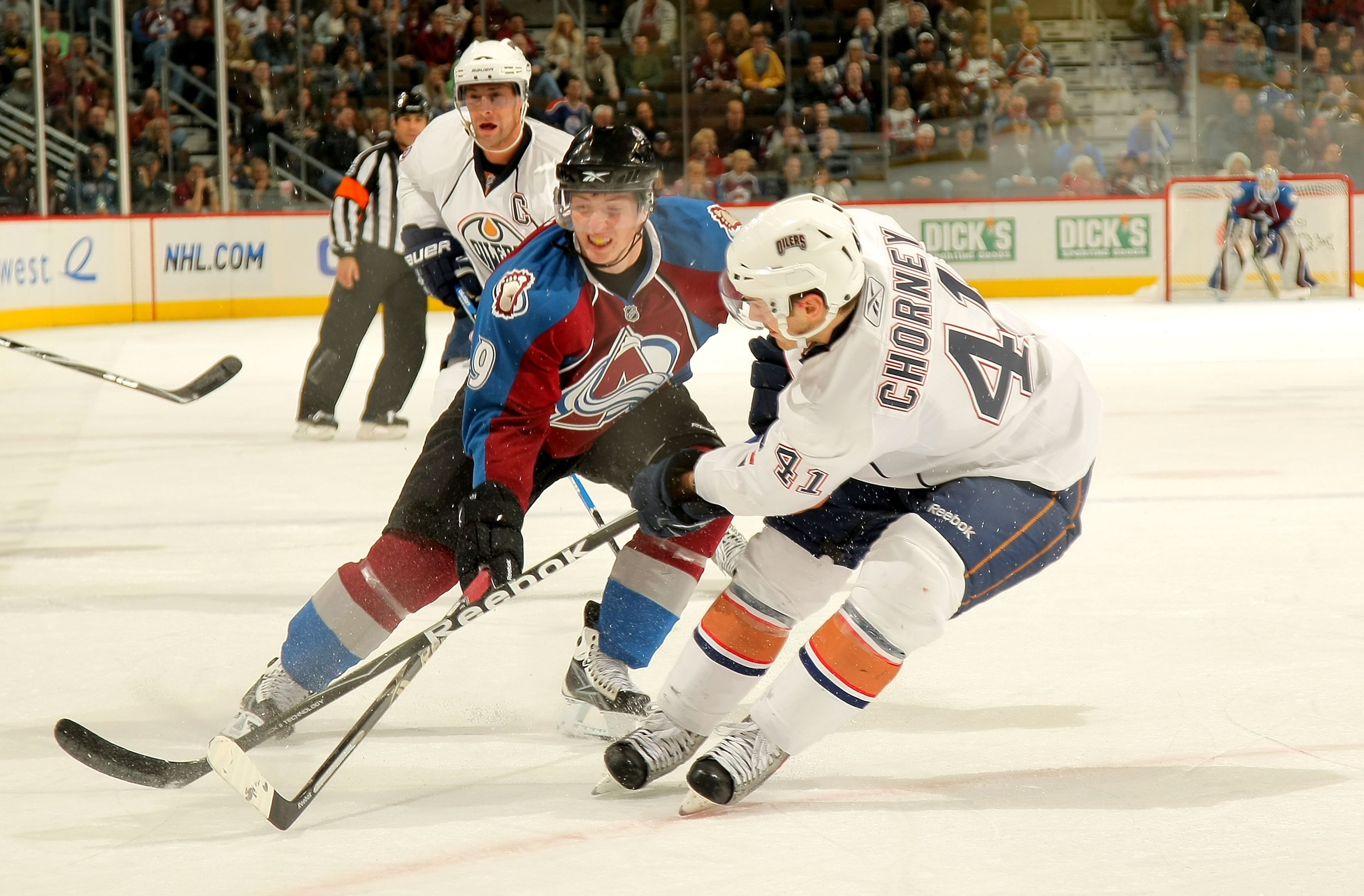 DENVER - NOVEMBER 08:  Matt Duchene #9 of the Colorado Avalanche battles Taylor Chorney #41 of the Edmonton Oilers during NHL action at the Pepsi Center on November 8, 2009 in Denver, Colorado. The Oilers defeated the Avalanche 5-3.  (Photo by Doug Pensin