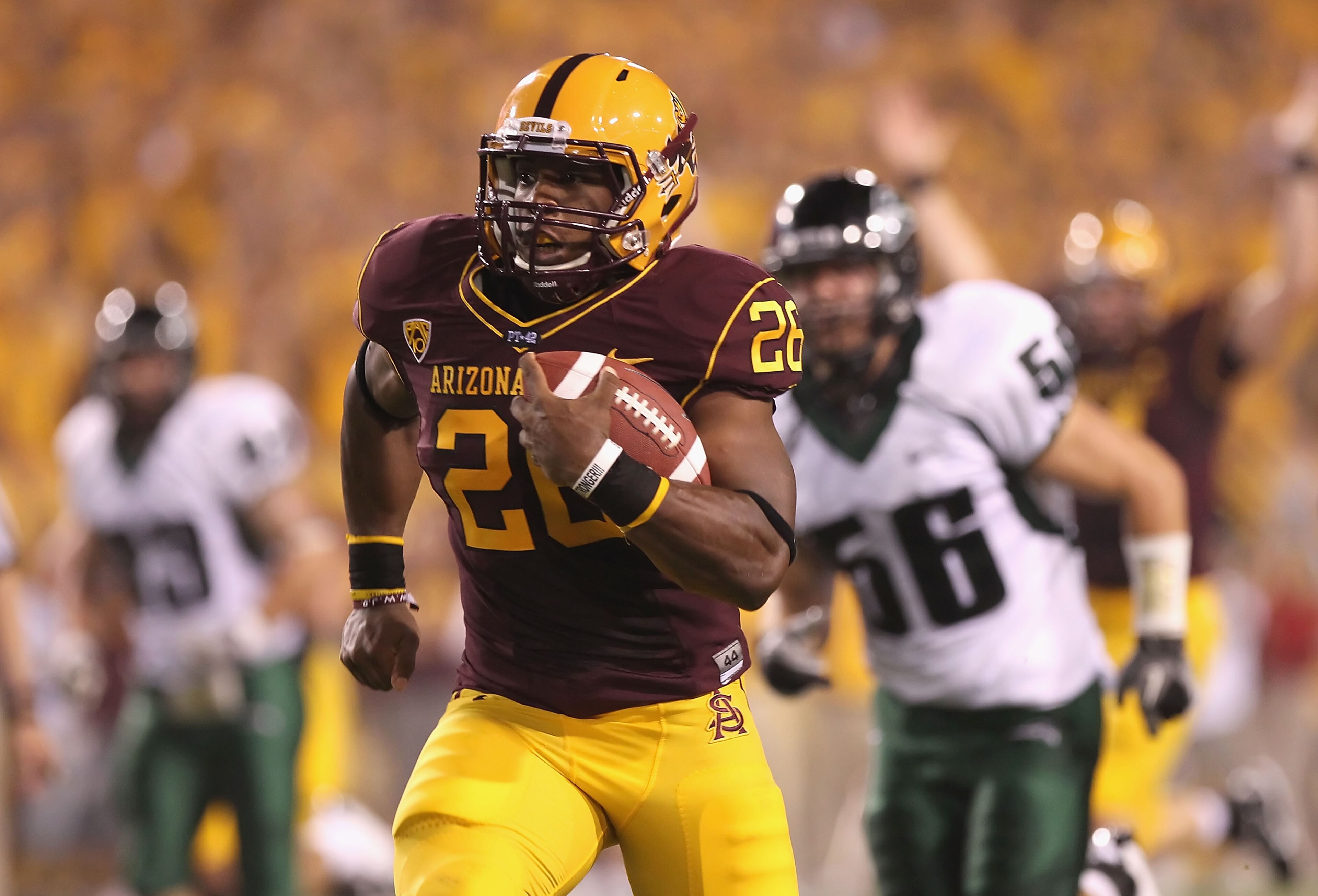 TEMPE, AZ - SEPTEMBER 04:  Runningback Cameron Marshall #26 of the Arizona State Sun Devils rushes the ball for a 50 yard touchdown against the Portland State Vikings during the first quarter of the college football game at Sun Devil Stadium on September