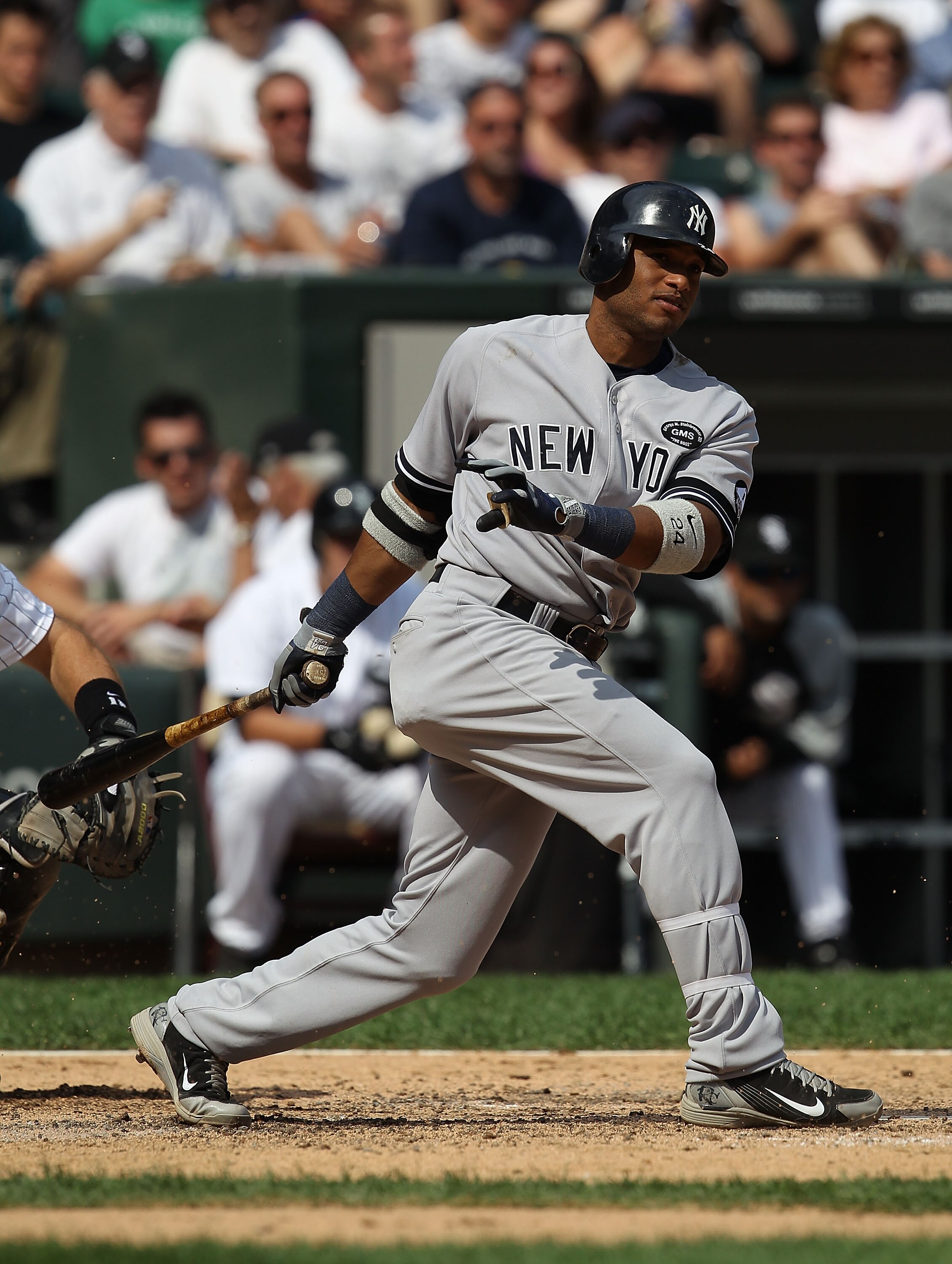 CHICAGO - AUGUST 29: Robinson Cano #24 of the New York Yankees hits the ball against the Chicago White Sox at U.S. Cellular Field on August 29, 2010 in Chicago, Illinois. The Yankees defeated the White Sox 2-1. (Photo by Jonathan Daniel/Getty Images)