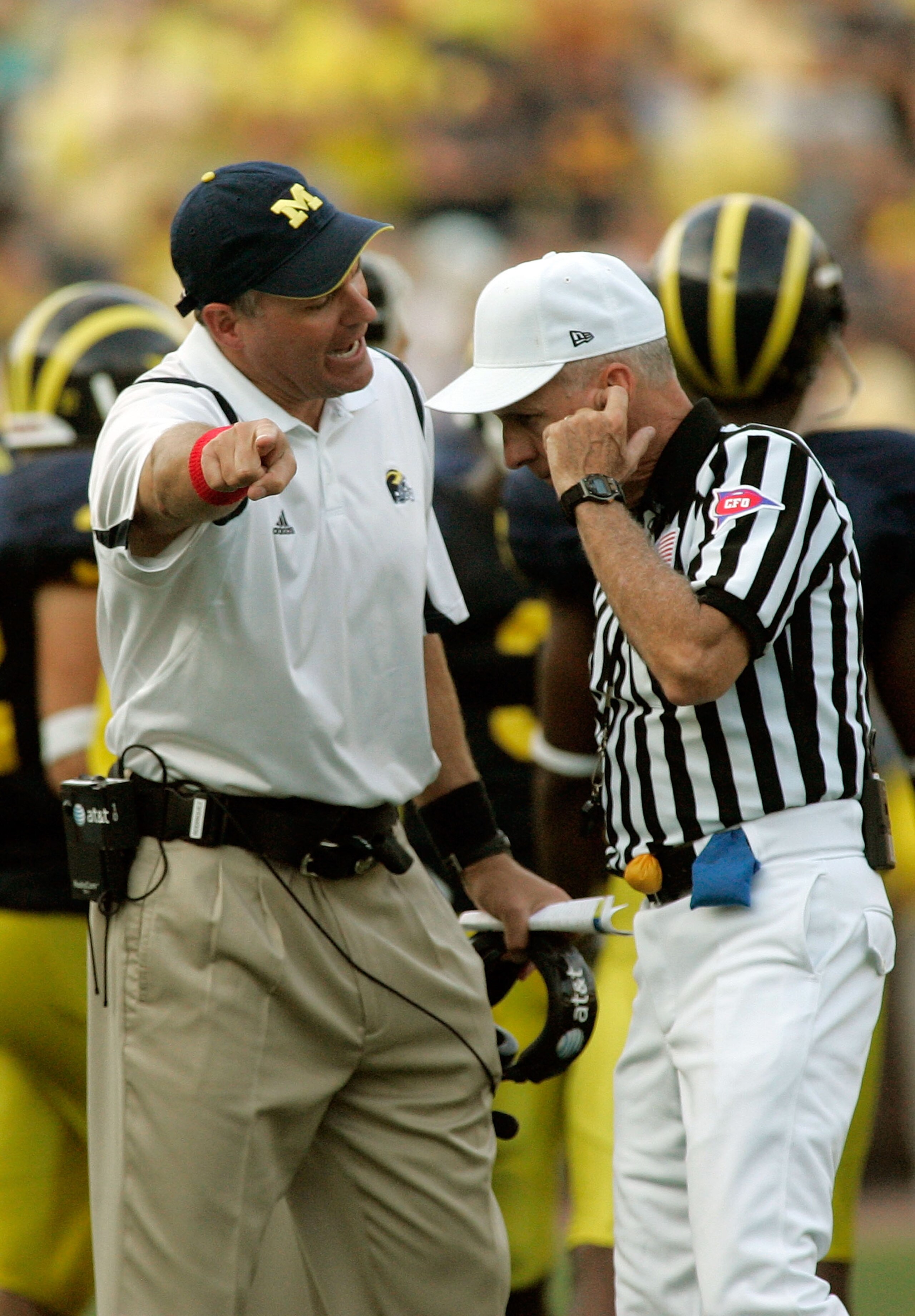 ANN ARBOR, MI - SEPTEMBER 12:  Michigan head coach Rich Rodriguez argues a call with an official in the second half against Notre Dame at Michigan Stadium on September 12, 2009 in Ann Arbor, Michigan.  (Photo by Domenic Centofanti/Getty Images)