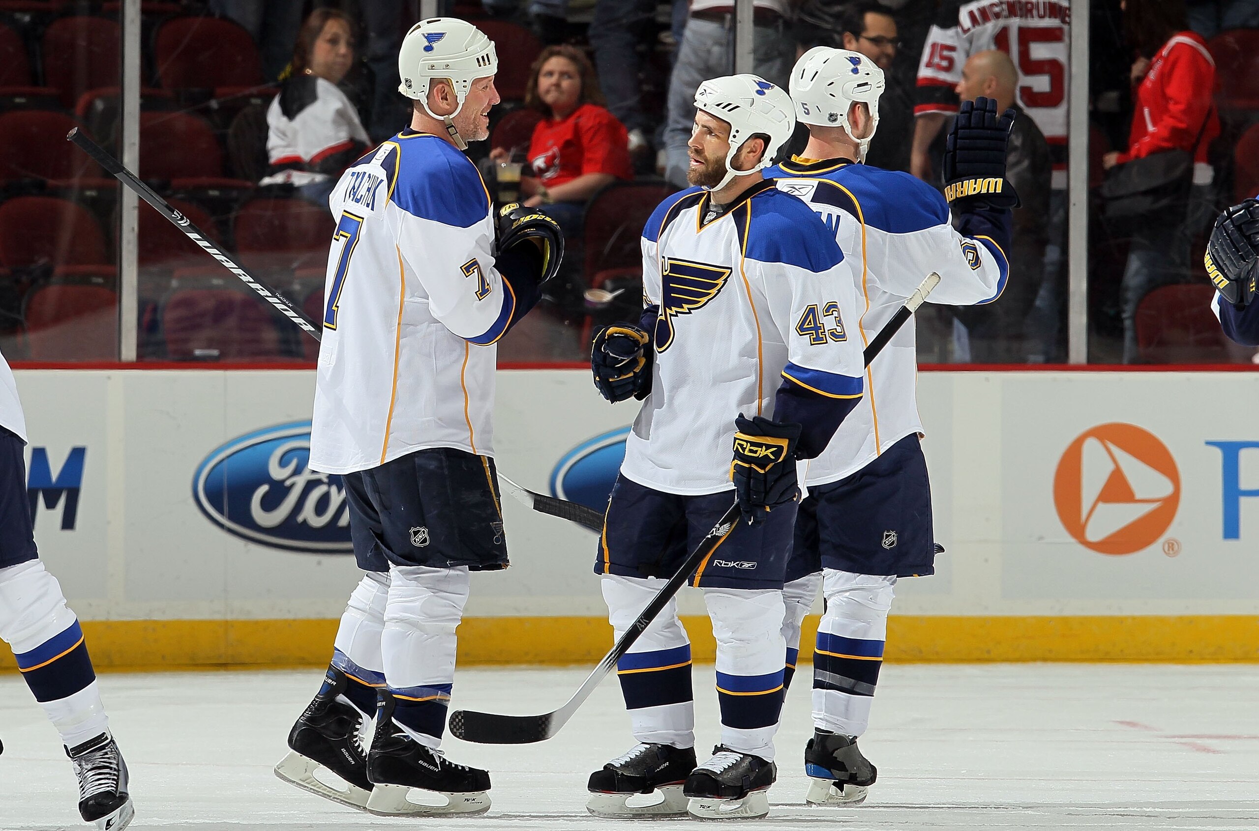 NEWARK, NJ - MARCH 20:  Mike Weaver #43 and Keith Tkachuk #7 of the St. Louis Blues celebrate after defeating the New Jersey Devils at the Prudential Center on March 20, 2010 in Newark, New Jersey. The Blues defeated the Devils 1-0.  (Photo by Jim McIsaac