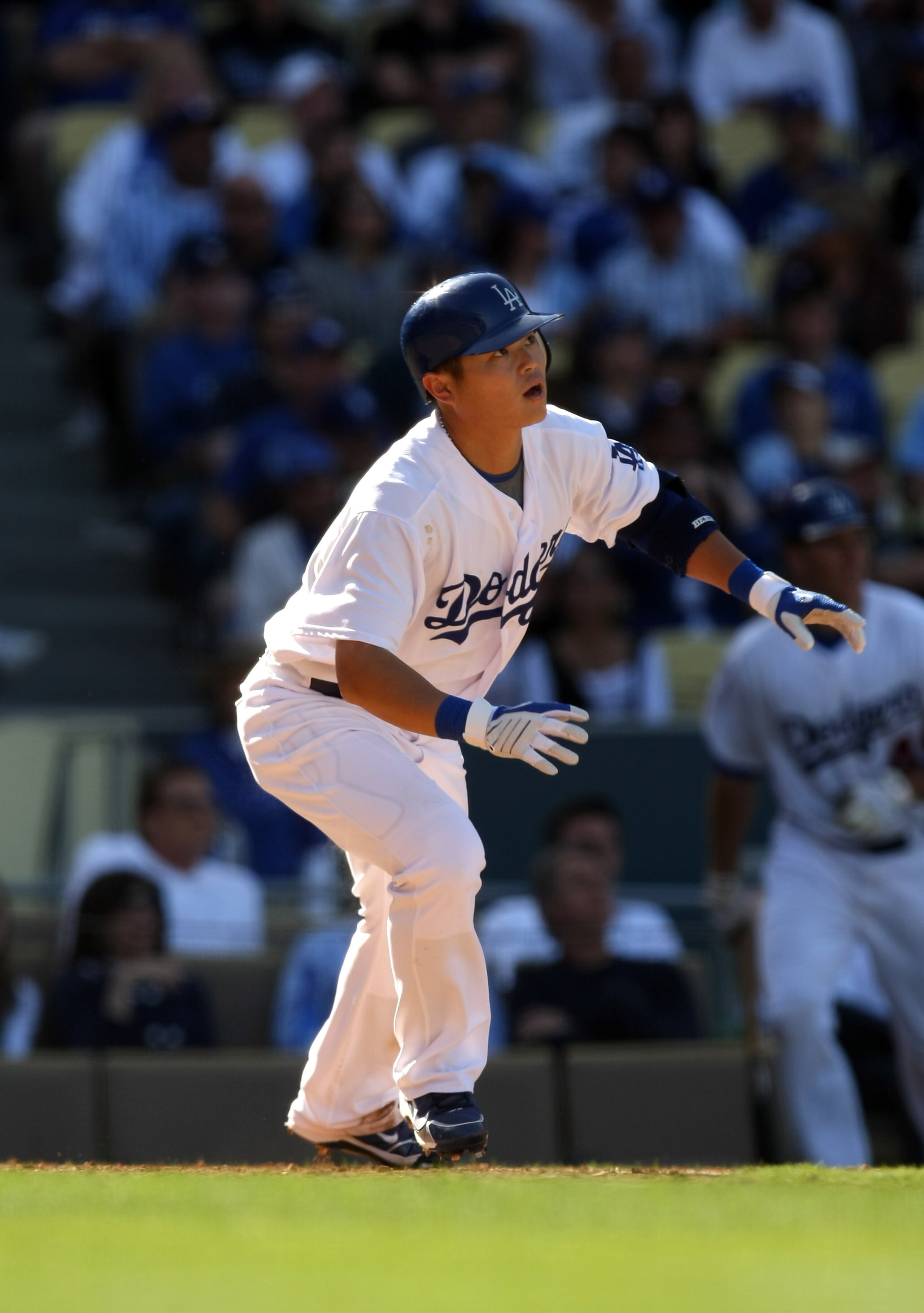 LOS ANGELES - OCTOBER 4:  Chin-lung Hu #60 of the Los Angeles Dodgers watches his RBI double in the seventh inning against the Colorado Rockies on October 4, 2009 at Dodger Stadium in Los Angeles, California.   The Dodgers won 5-3.  (Photo by Stephen Dunn
