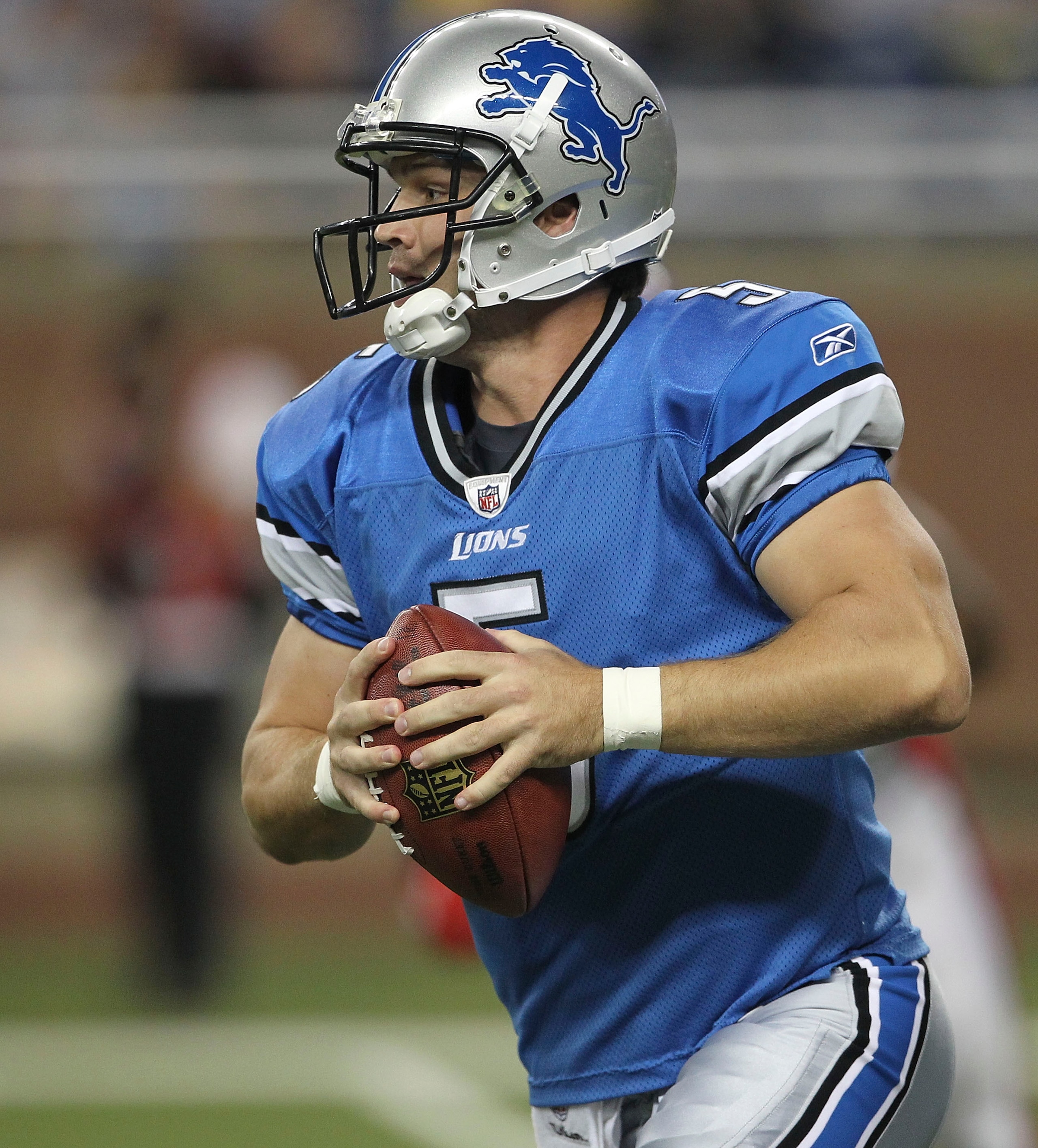 DETROIT - SEPTEMBER 02:  Drew Stanton #5 of the Detroit Lions rolls out to pass during the preseason game against the Buffalo Bills at Ford Field on September 2, 2010 in Detroit, Michigan. The Lions defeated the Bills 28-23.  (Photo by Leon Halip/Getty Im