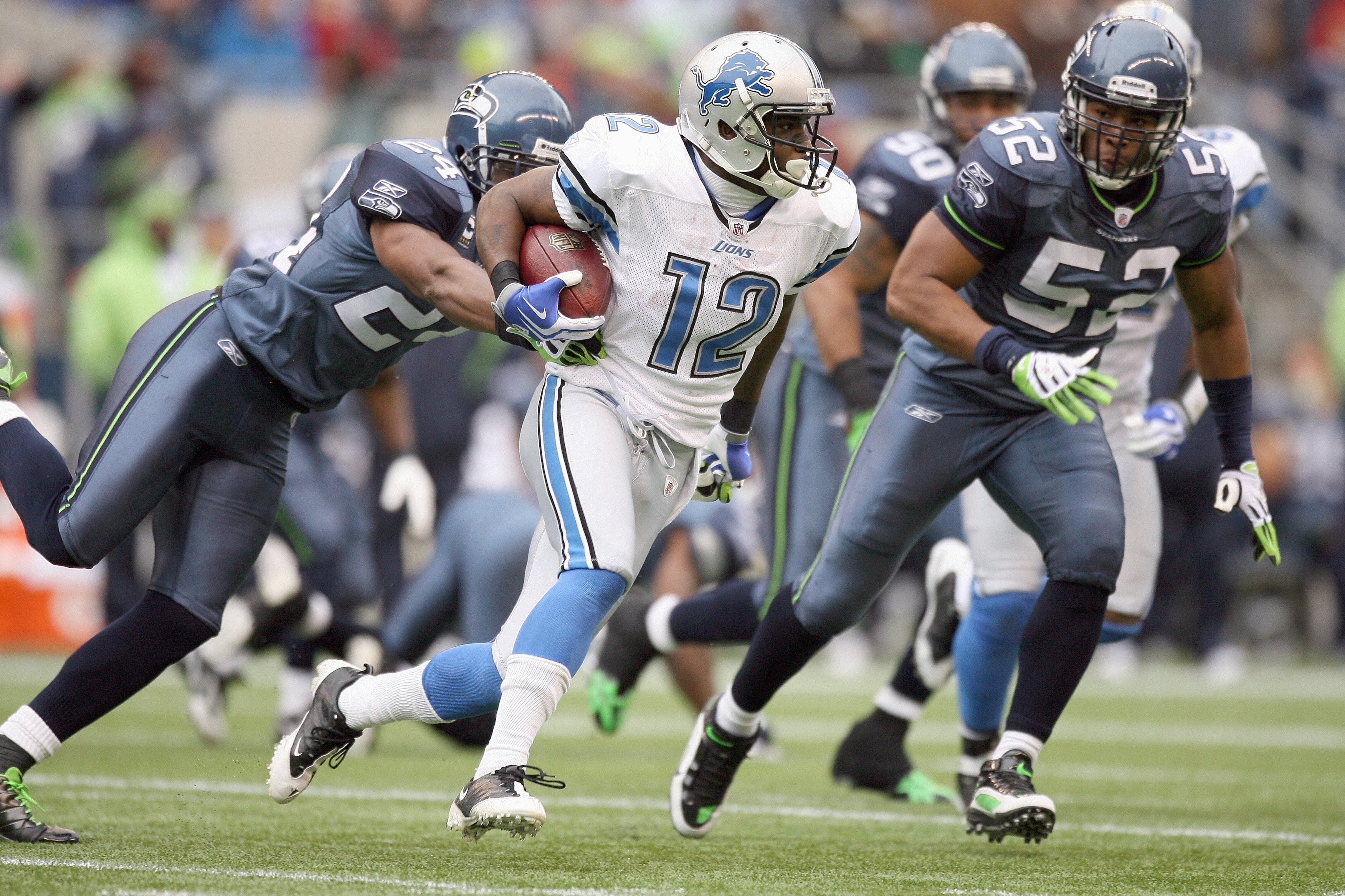 SEATTLE - NOVEMBER 08:  Derrick Williams #12 of the Detroit Lions carries the ball during the game against the Seattle Seahawks on November 8, 2009 at Qwest Field in Seattle, Washington. The Seahawks defeated the Lions 32-20. (Photo by Otto Greule Jr/Gett
