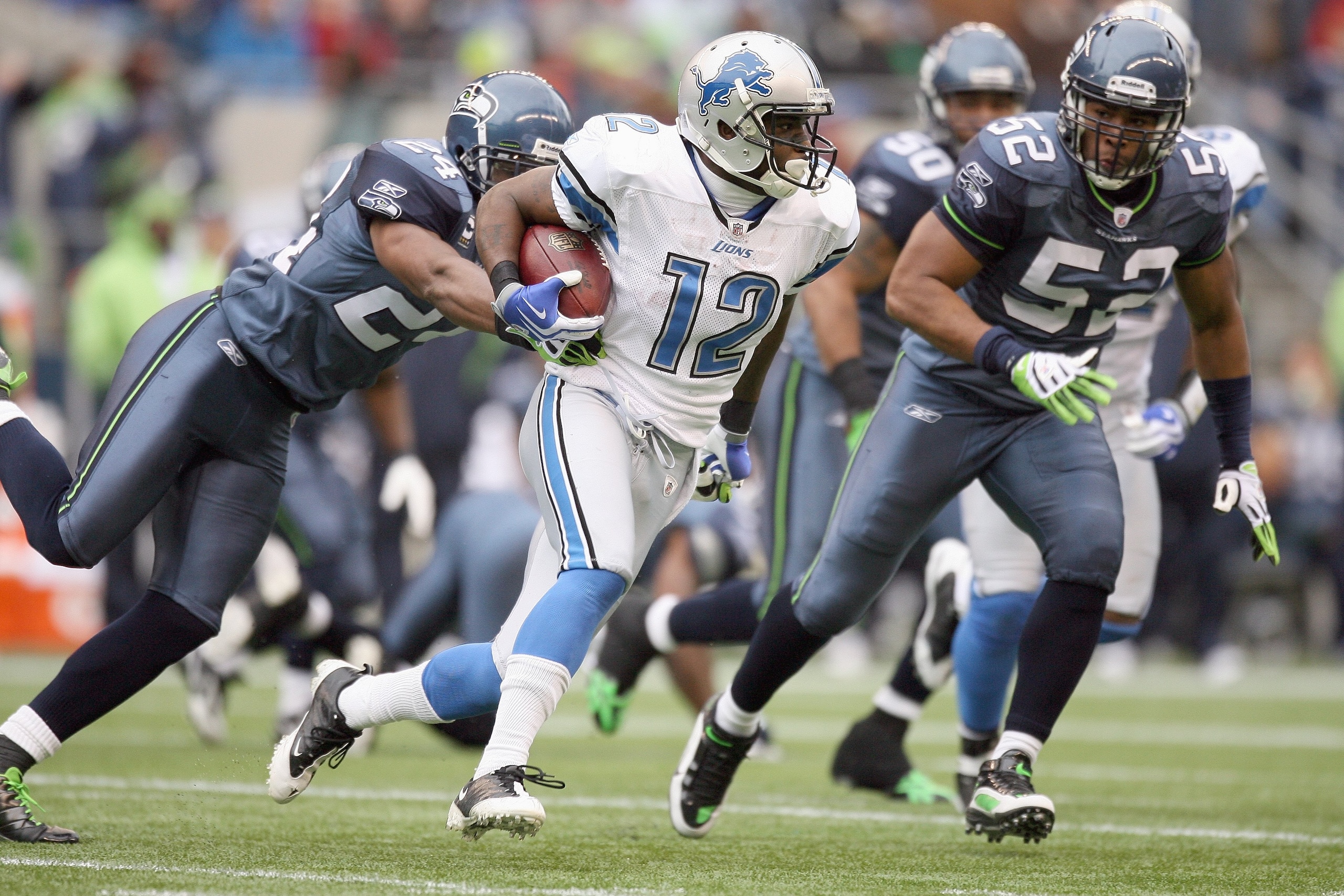 SEATTLE - NOVEMBER 08:  Derrick Williams #12 of the Detroit Lions carries the ball during the game against the Seattle Seahawks on November 8, 2009 at Qwest Field in Seattle, Washington. The Seahawks defeated the Lions 32-20. (Photo by Otto Greule Jr/Gett
