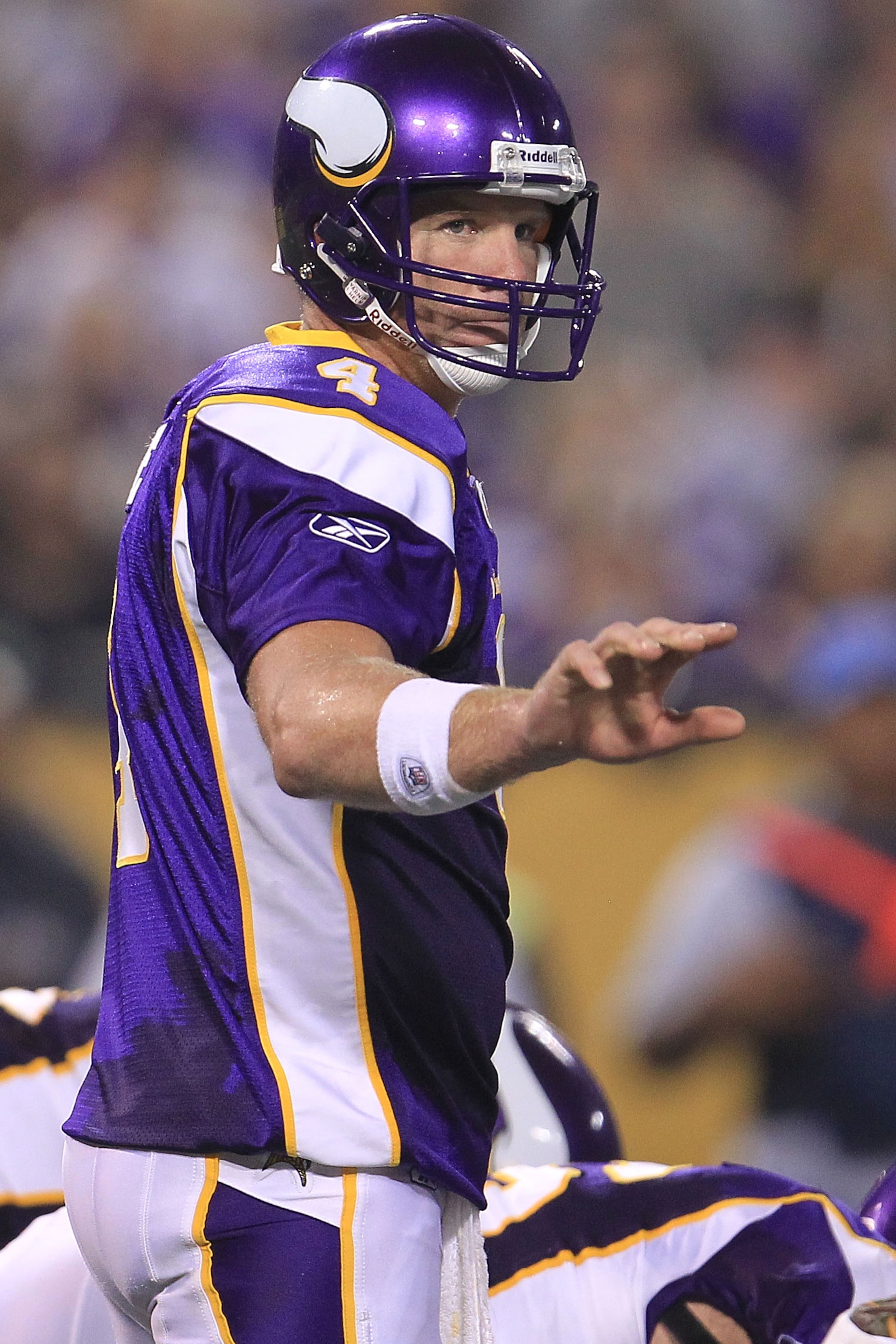 MINNEAPOLIS - AUGUST 28: Brett Favre #4 of the Minnesota Vikings gives instructions against the Seattle Seahawks during a preseason NFL game at Mall of America Field at the Hubert H. Humphrey Metrodome on August 28, 2010 in Minneapolis, Minnesota. (Pho MINNEAPOLIS - AUGUST 28: Brett Favre #4 of the Minnesota Vikings gives instructions against the Seattle Seahawks during a preseason NFL game at Mall of America Field at the Hubert H. Humphrey Metrodome on August 28, 2010 in Minneapolis, Minnesota. (Pho