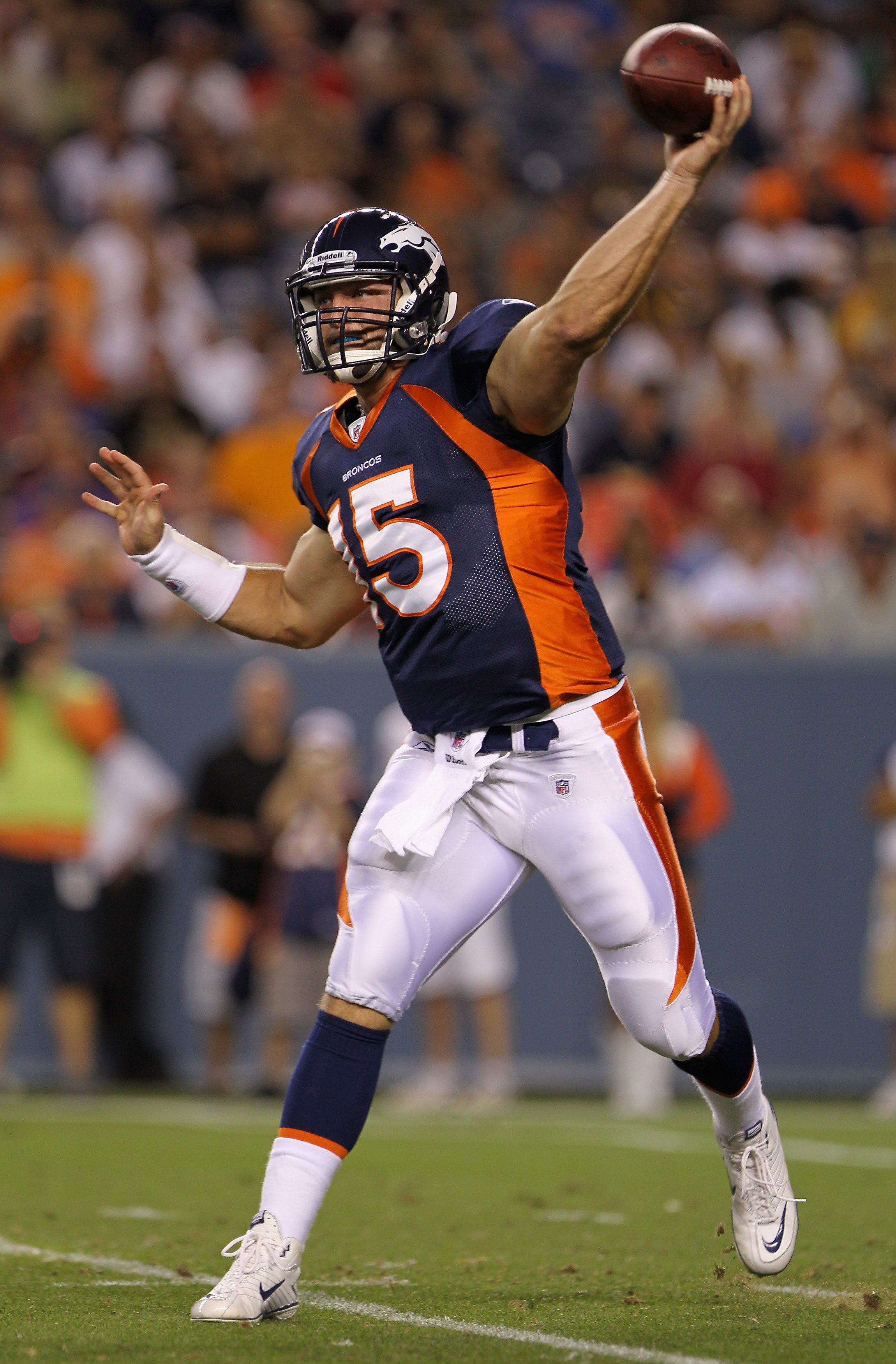 DENVER - AUGUST 29:  Quarterback Tim Tebow #15 of the Denver Broncos delivers a pass against the Pittsburgh Steelers during preseason NFL action at INVESCO Field at Mile High on August 29, 2010 in Denver, Colorado.  (Photo by Doug Pensinger/Getty Images)