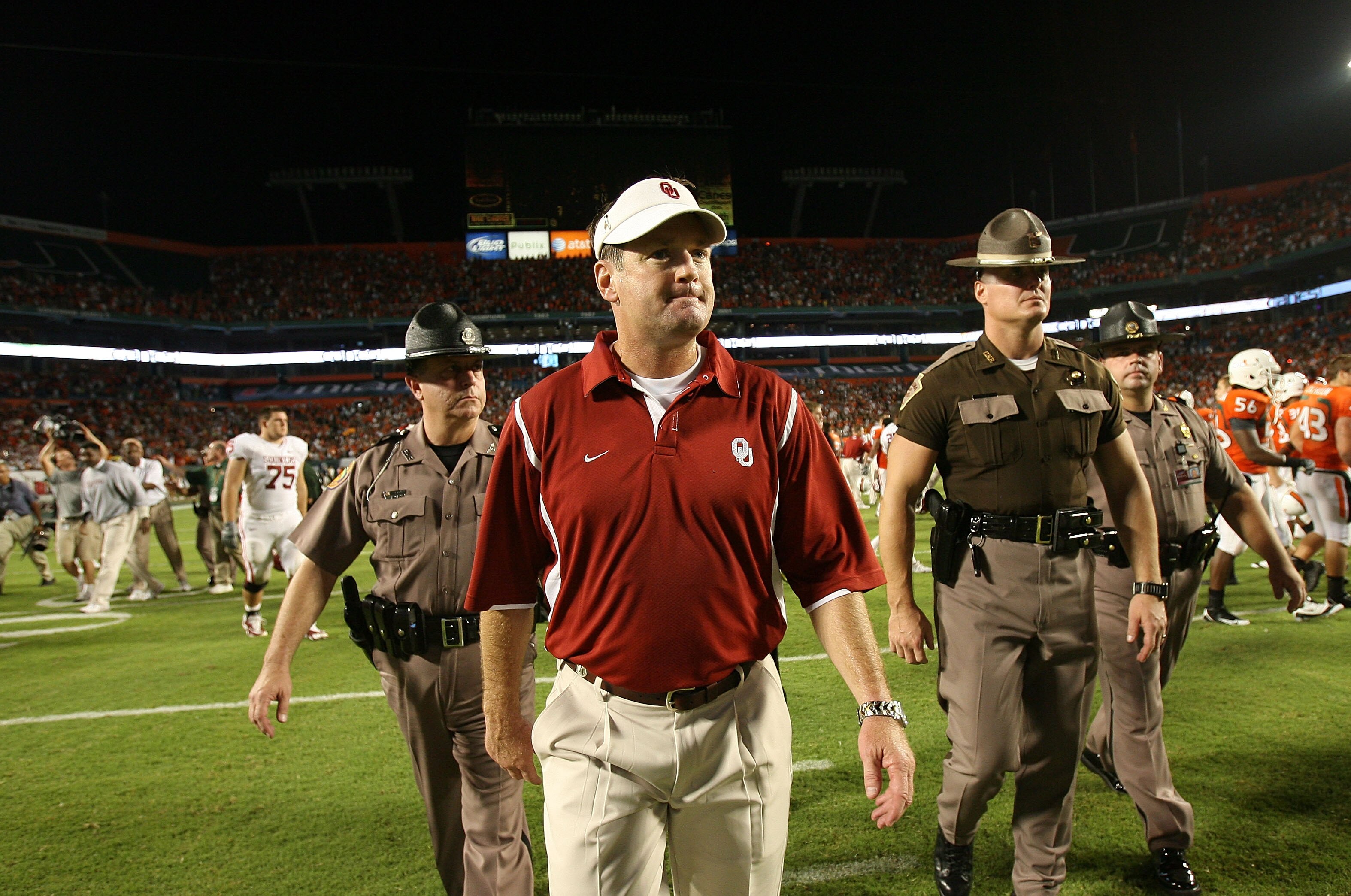 FORT LAUDERDALE, FL - OCTOBER 03: Head coach Bob Stoops of the Oklahoma Sooners walks off the field after his team lost to the Miami Hurricanes at Land Shark Stadium on October 3, 2009 in Fort Lauderdale, Florida. Miami defeated Oklahoma 21-20. (Photo by