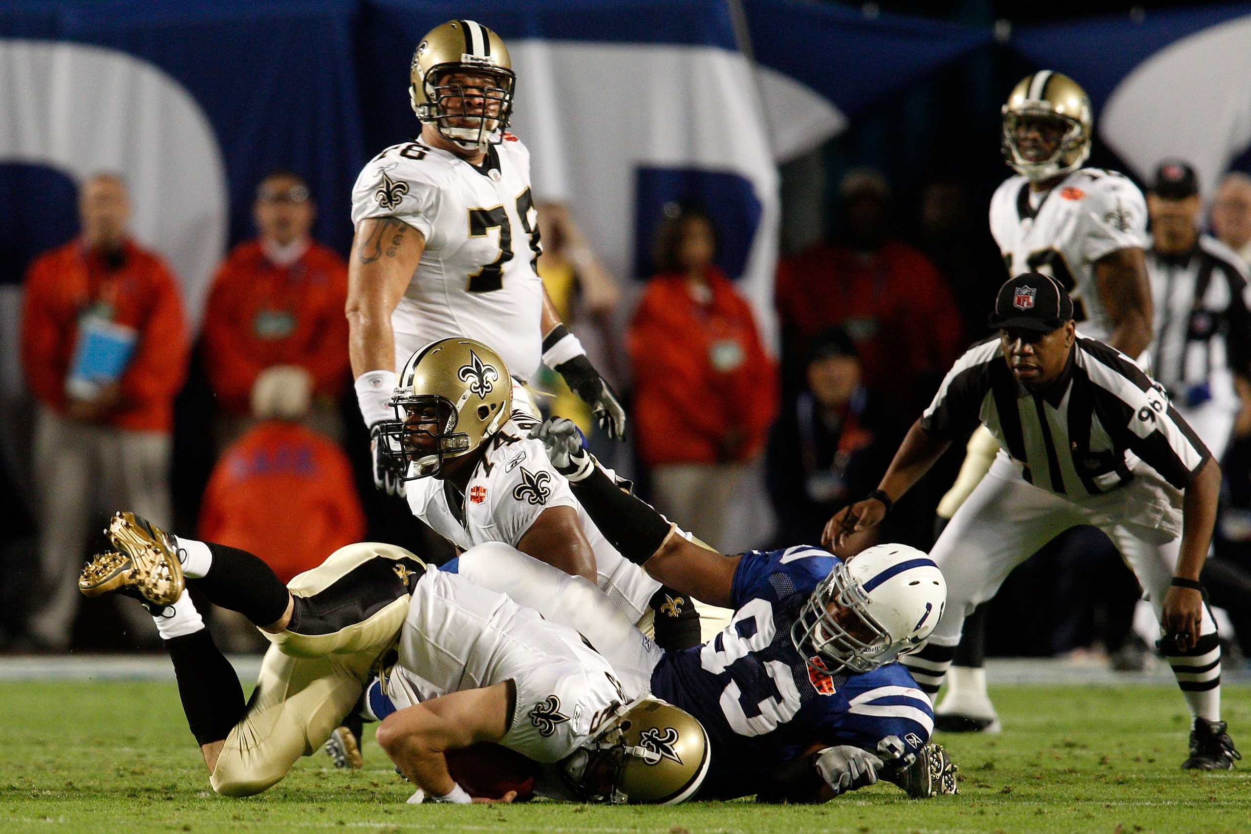 MIAMI GARDENS, FL - FEBRUARY 07:  Chris Reis #39 of the New Orleans Saints fight for the ball against Hank Baskett #81 of the Indianapolis Colts after a onside kick to start the second half with during Super Bowl XLIV on February 7, 2010 at Sun Life Stadi