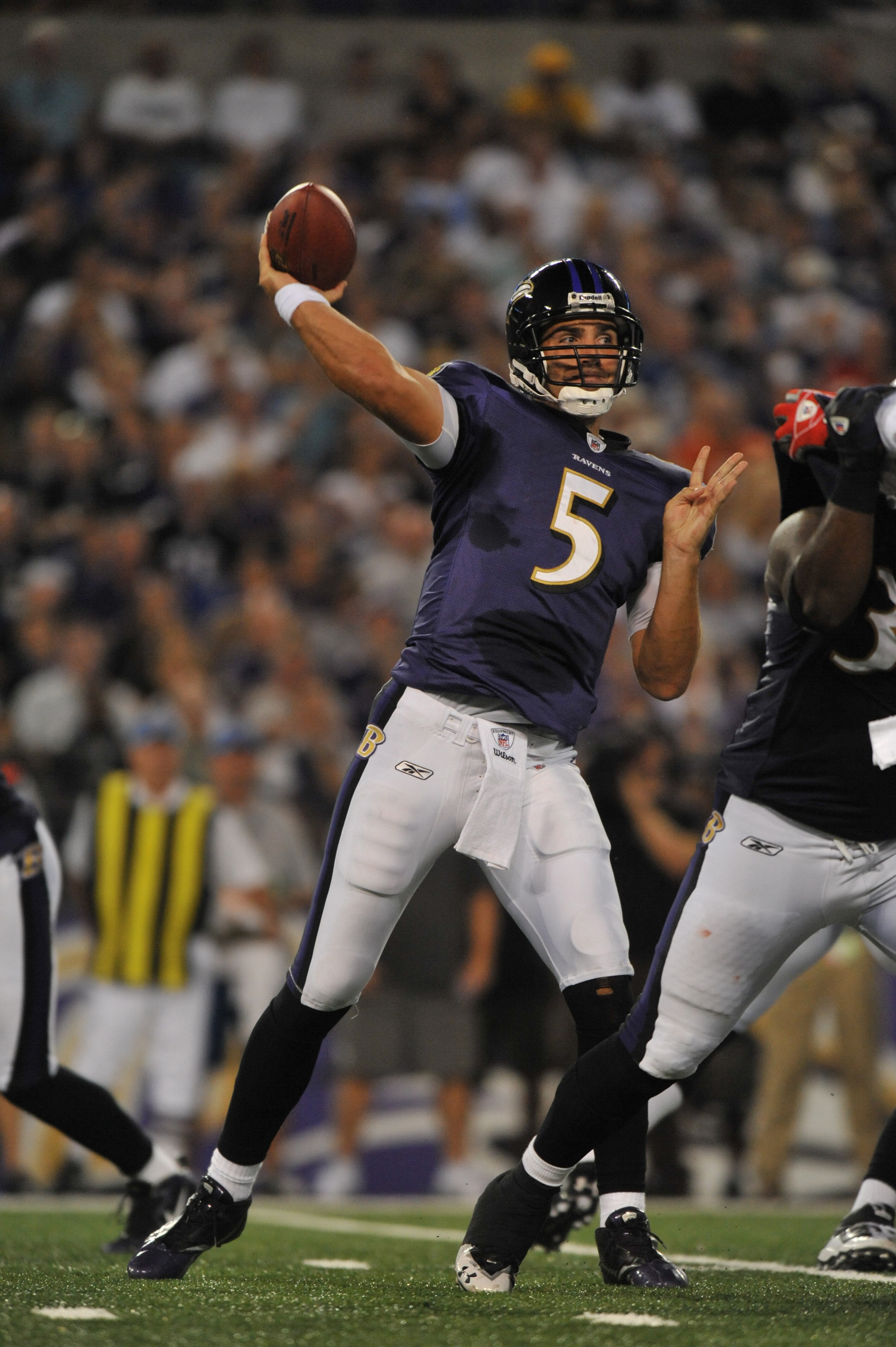BALTIMORE - AUGUST 28:  Joe Flacco #5 of the Baltimore Ravens passes against the New York Giants at M&T Bank Stadium on August 28, 2010 in Baltimore, Maryland. The Ravens lead the Giants 17-3. (Photo by Larry French/Getty Images)