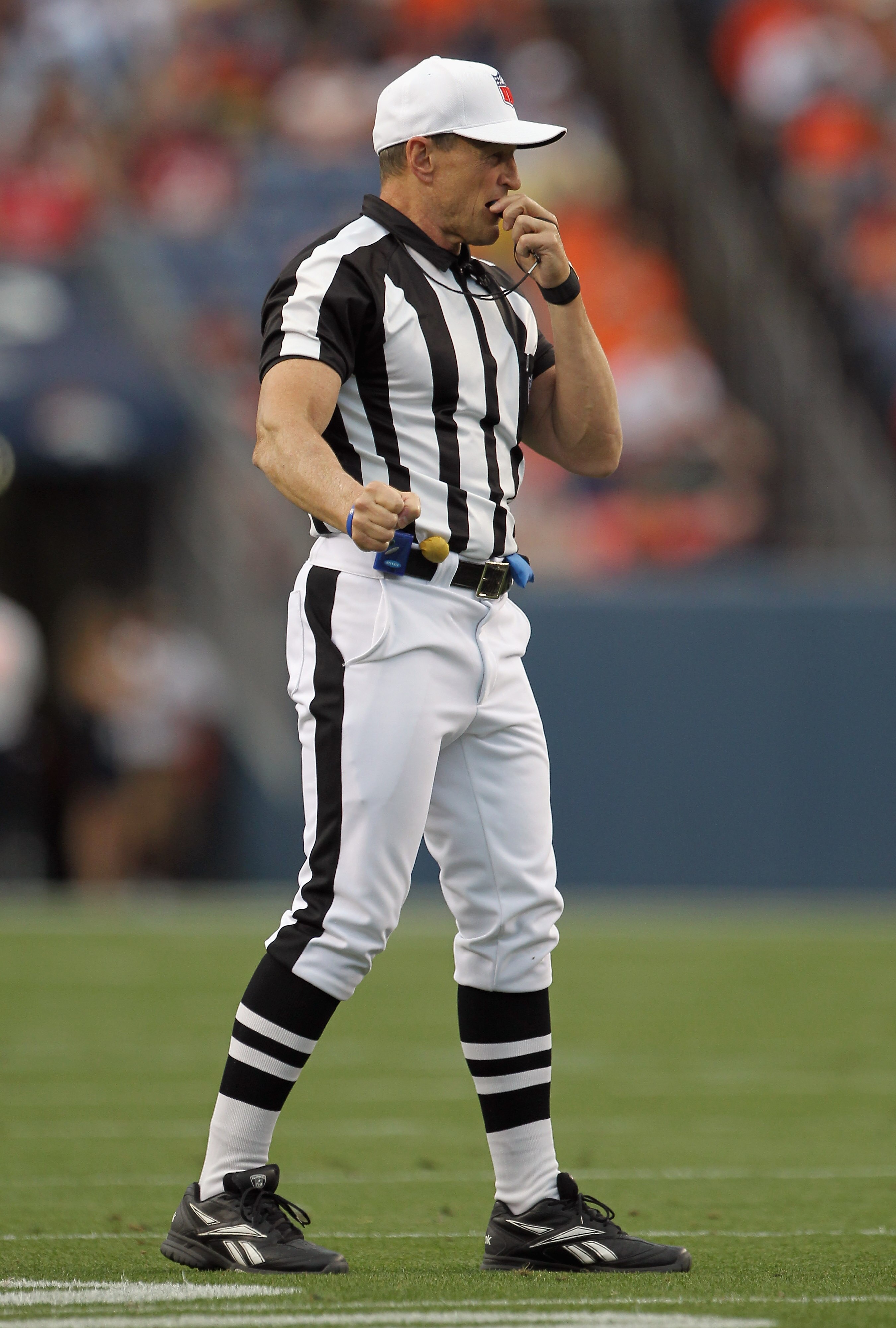 DENVER - AUGUST 21:  Referee Ed Hochuli oversees the action between the Denver Broncos and the Detroit Lions during preseason NFL action at INVESCO Field at Mile High on August 21, 2010 in Denver, Colorado. The Lions defeated the Broncos 25-20.  (Photo by
