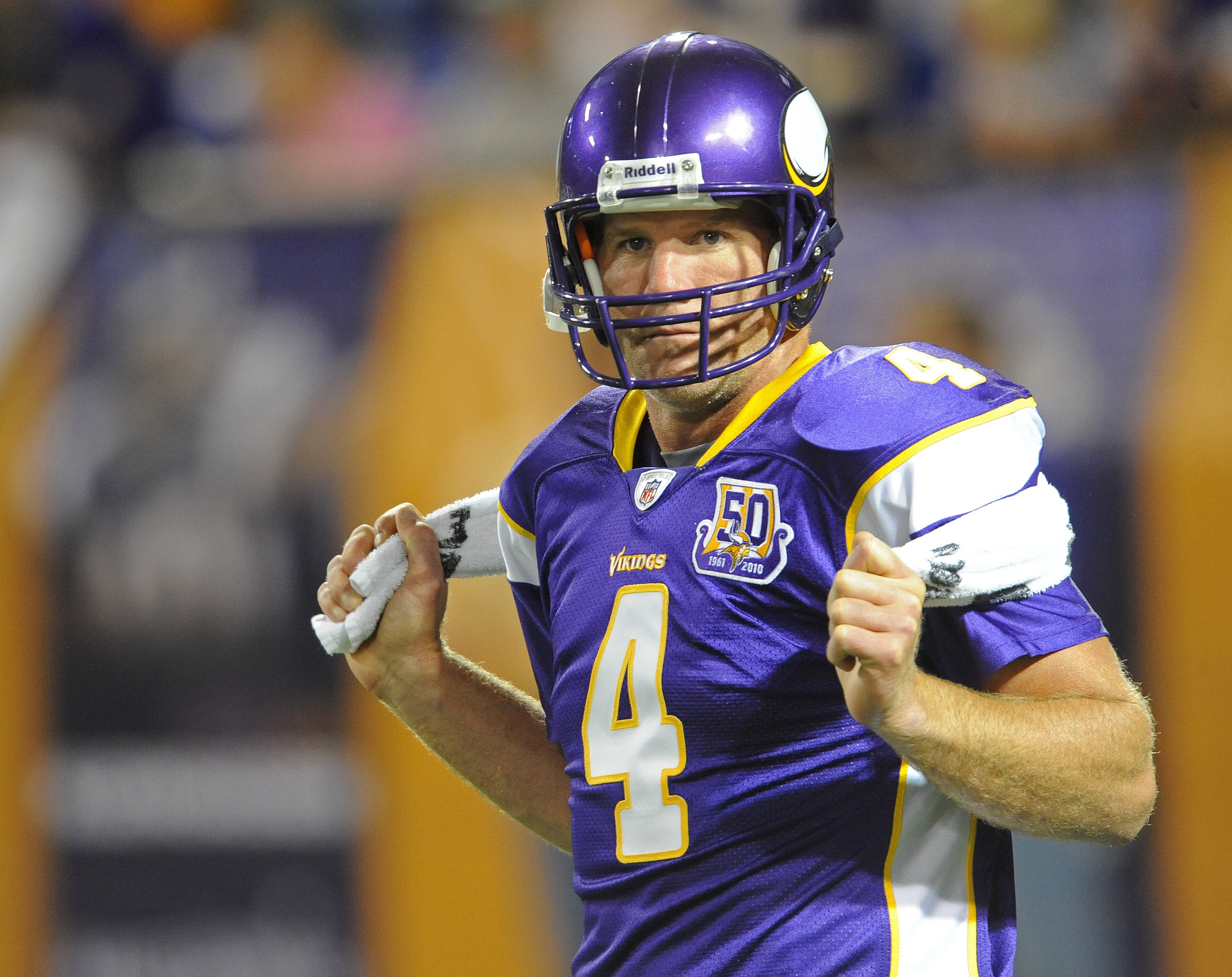 MINNEAPOLIS - SEPTEMBER 02:  Brett Favre #4 of the Minnesota Vikings stretches during warmups prior to an NFL preseason game against the Denver Broncos at the Mall of America Field at Hubert H. Humphrey Metrodome, on September 2, 2010 in Minneapolis, Minn