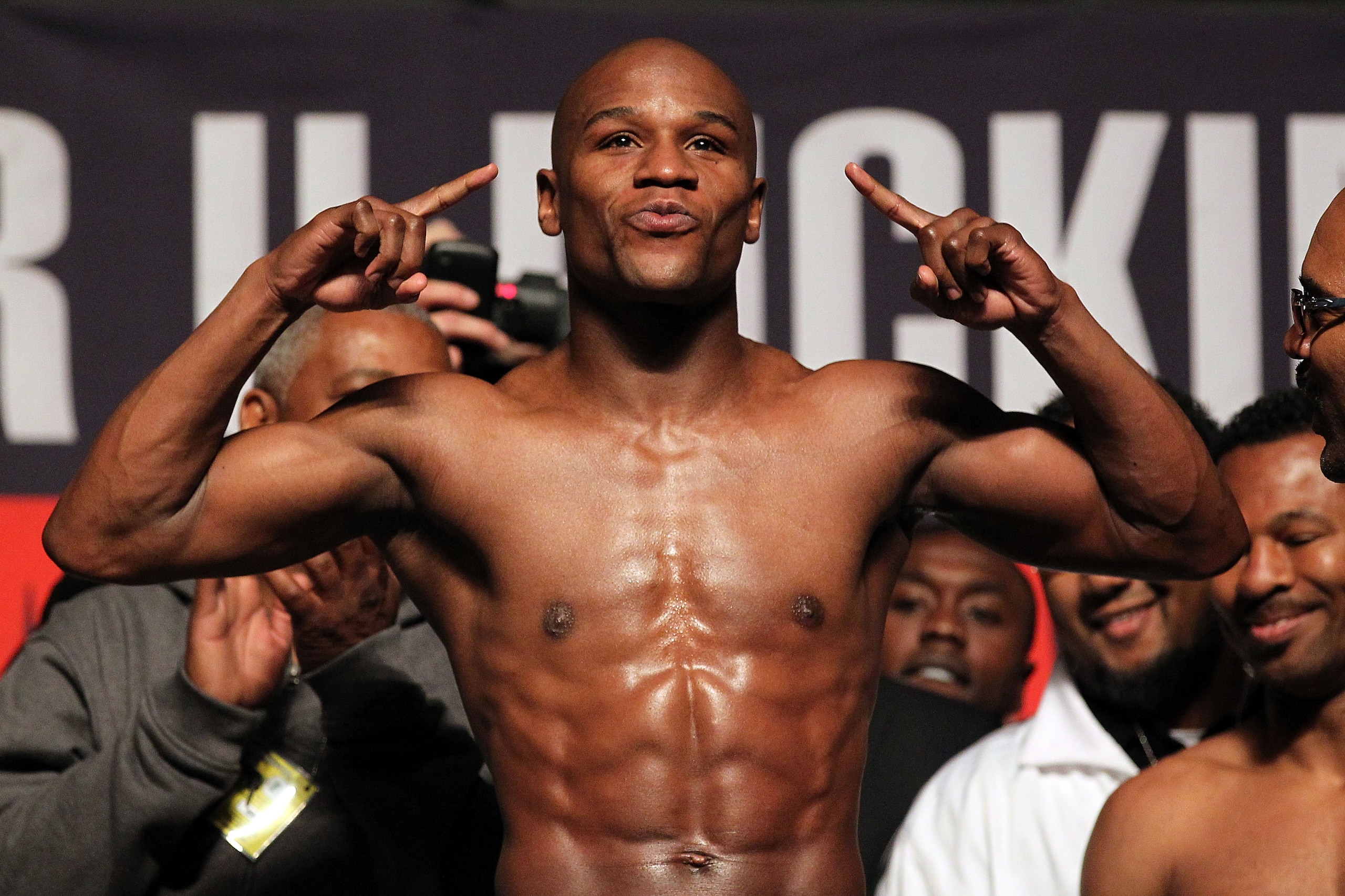 LAS VEGAS - APRIL 30:  Boxer Floyd Mayweather Jr. steps on the scale to weigh 146 pounds during the weigh-in for his bout against Shane Mosley at the MGM Grand Garden Arena on April 30, 2010 in Las Vegas, Nevada. Mayweather and Mosley will meet in a 12-ro