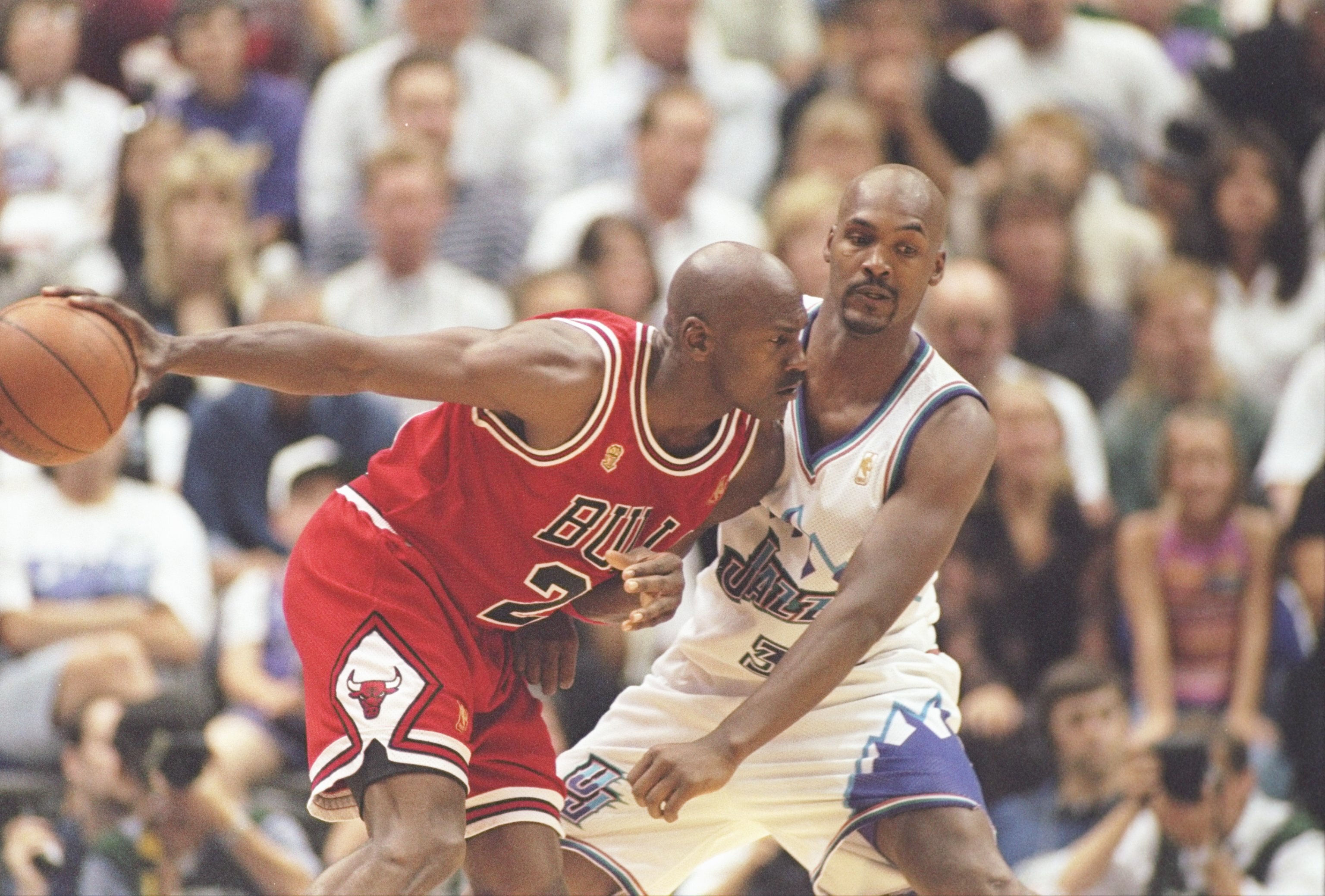 8 Jun 1997:  Guard Michael Jordan of the Chicago Bulls tries to drive past forward Bryon Russell of the Utah Jazz during a playoff game at the Delta Center in Salt Lake City, Utah.  The Jazz won the game 78-73.   Mandatory Credit: Brian Bahr  /Allsport