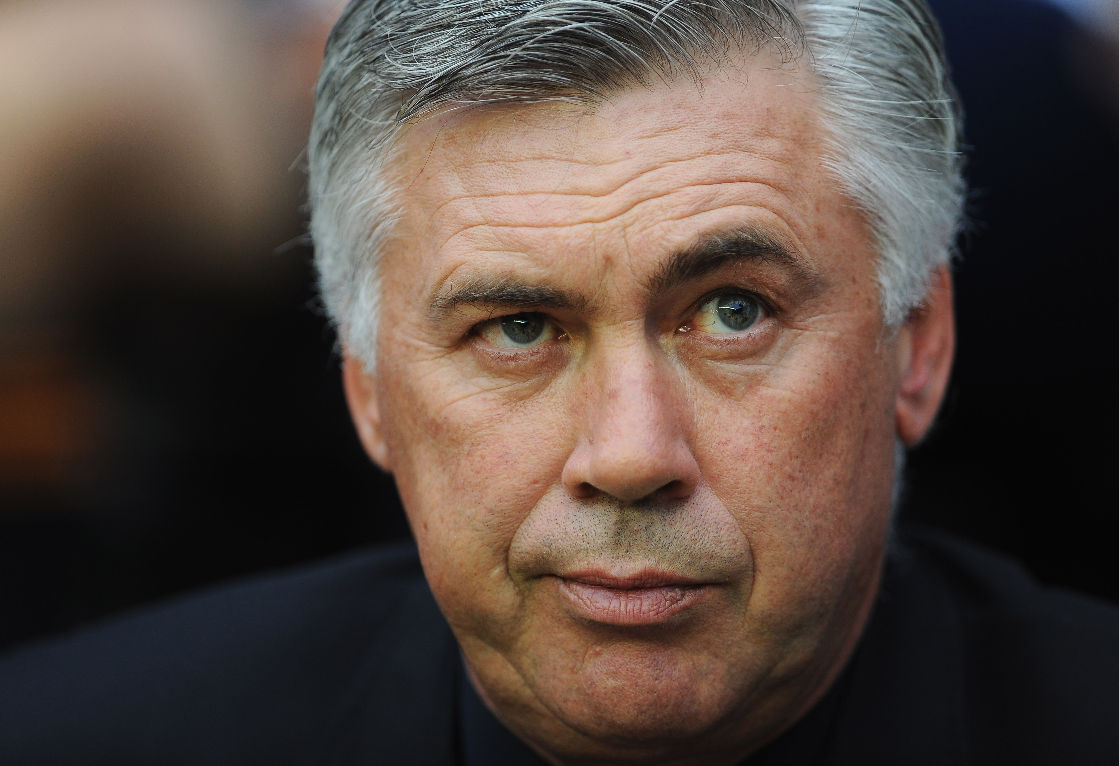 WIGAN, ENGLAND - AUGUST 21:  Carlo Ancelotti manager of Chelsea looks thoughtful prior to the Barclays Premier League match between Wigan Athletic and Chelsea at DW Stadium on August 21, 2010 in Wigan, England.  (Photo by Getty Images for Chelsea FC/Getty